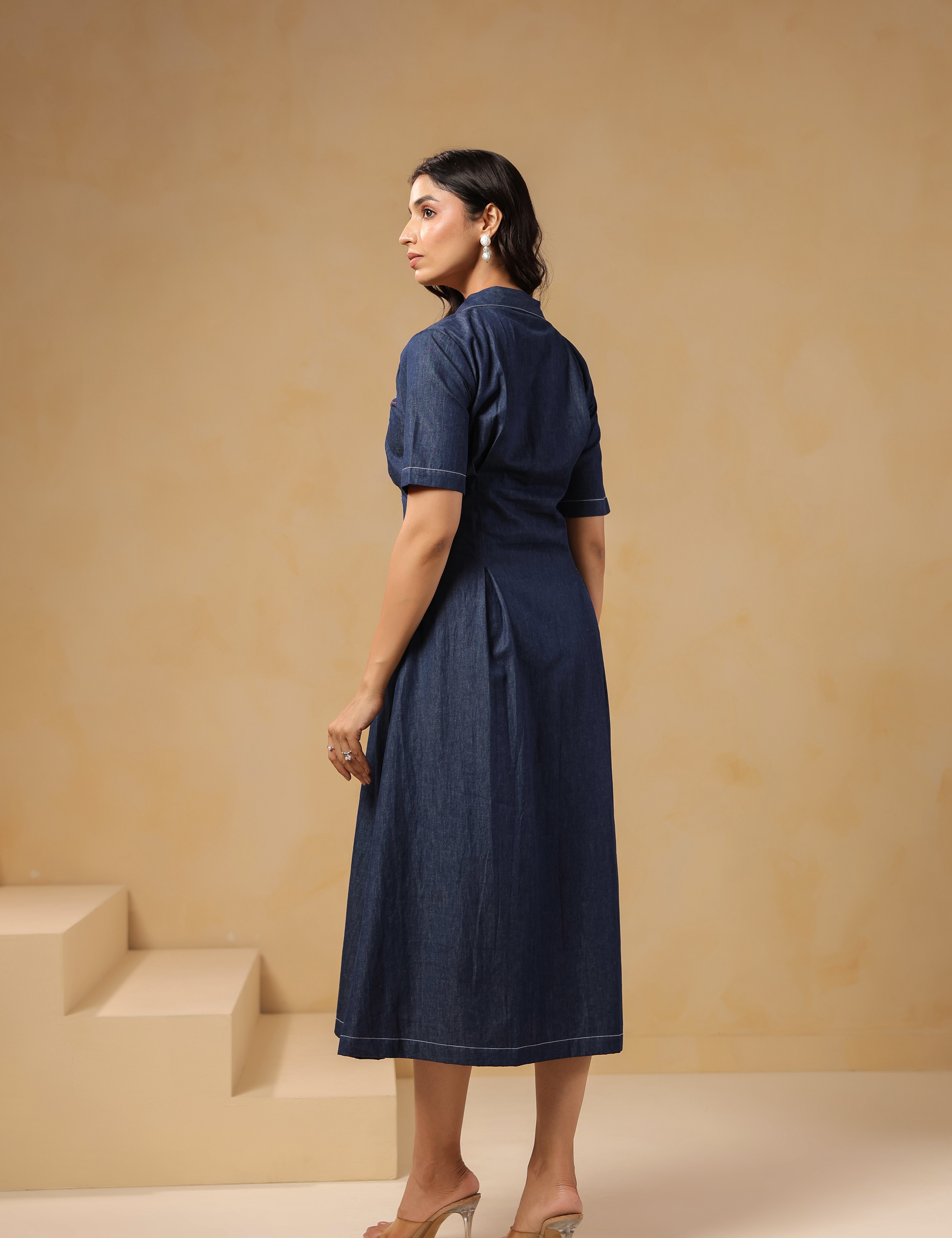 Back view of Aqua Prism Midi Dress, flared denim fit with mid-length sleeves