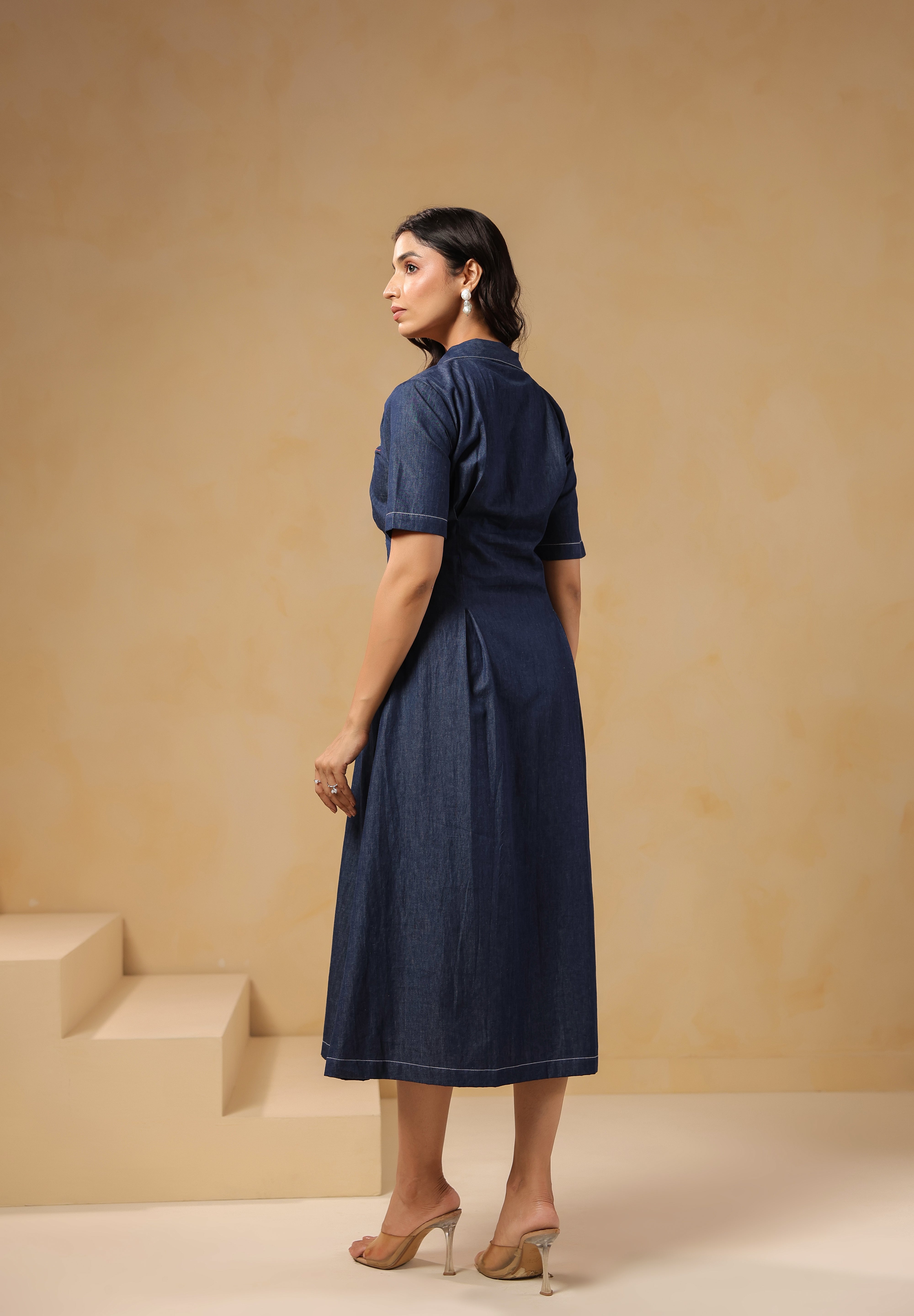 Back view of Aqua Prism Midi Dress, flared denim fit with mid-length sleeves