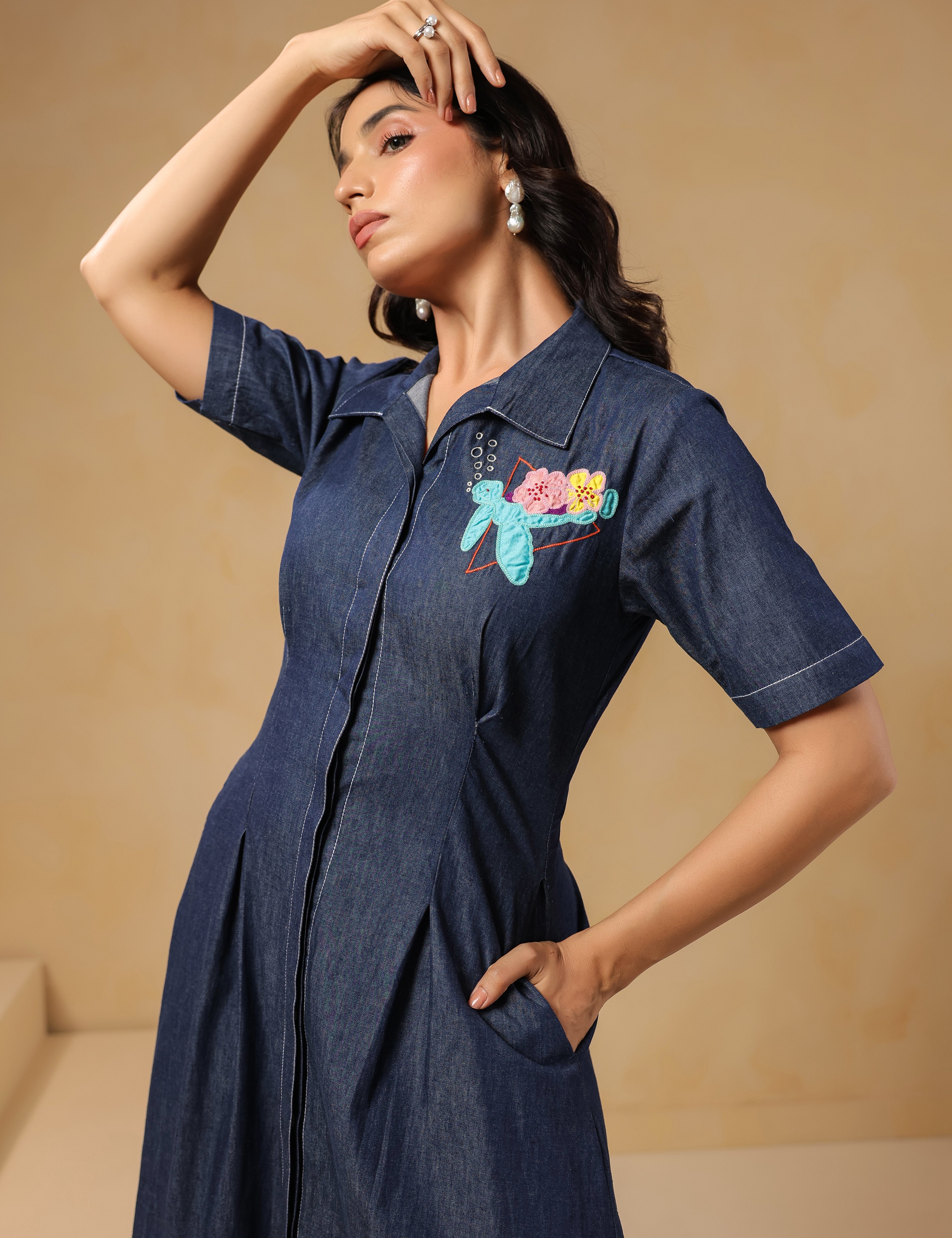 Aqua Prism Midi Dress side pose highlighting ocean-inspired turtle and floral embroidery