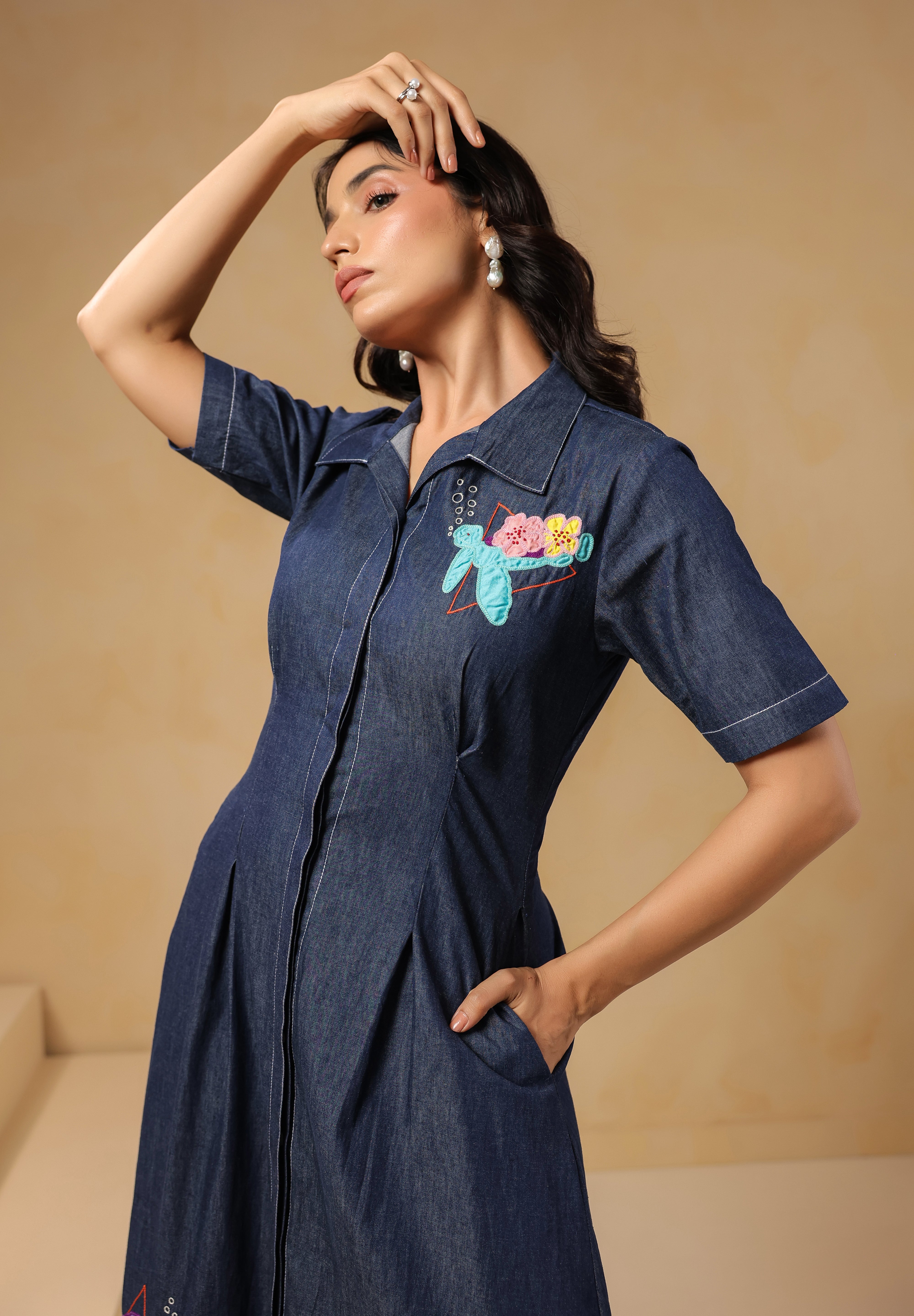 Aqua Prism Midi Dress side pose highlighting ocean-inspired turtle and floral embroidery