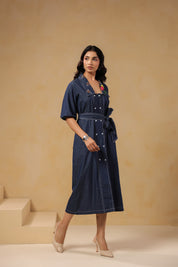 Side angle shot of Aviary Belted Midi Dress