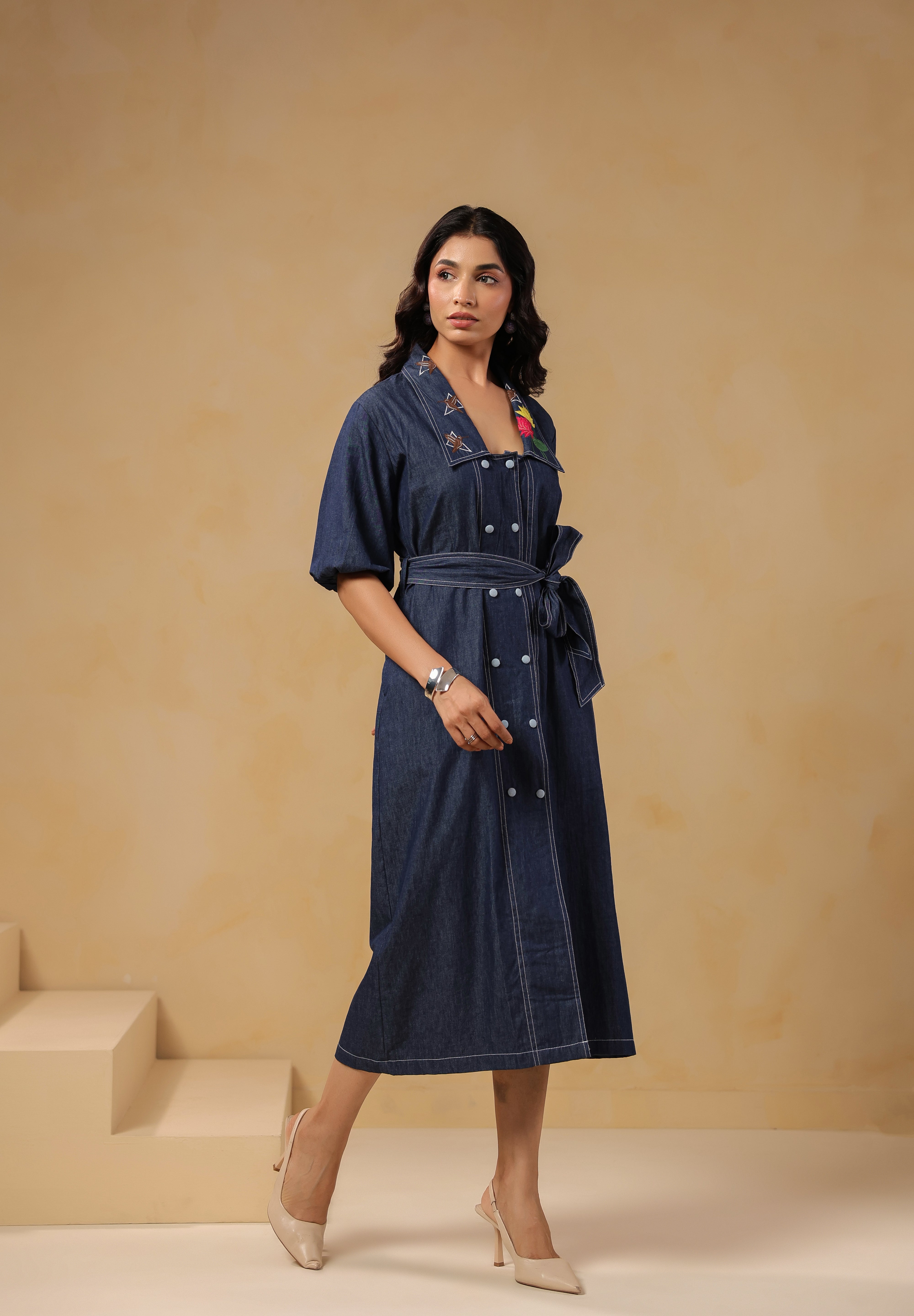 Side angle shot of Aviary Belted Midi Dress