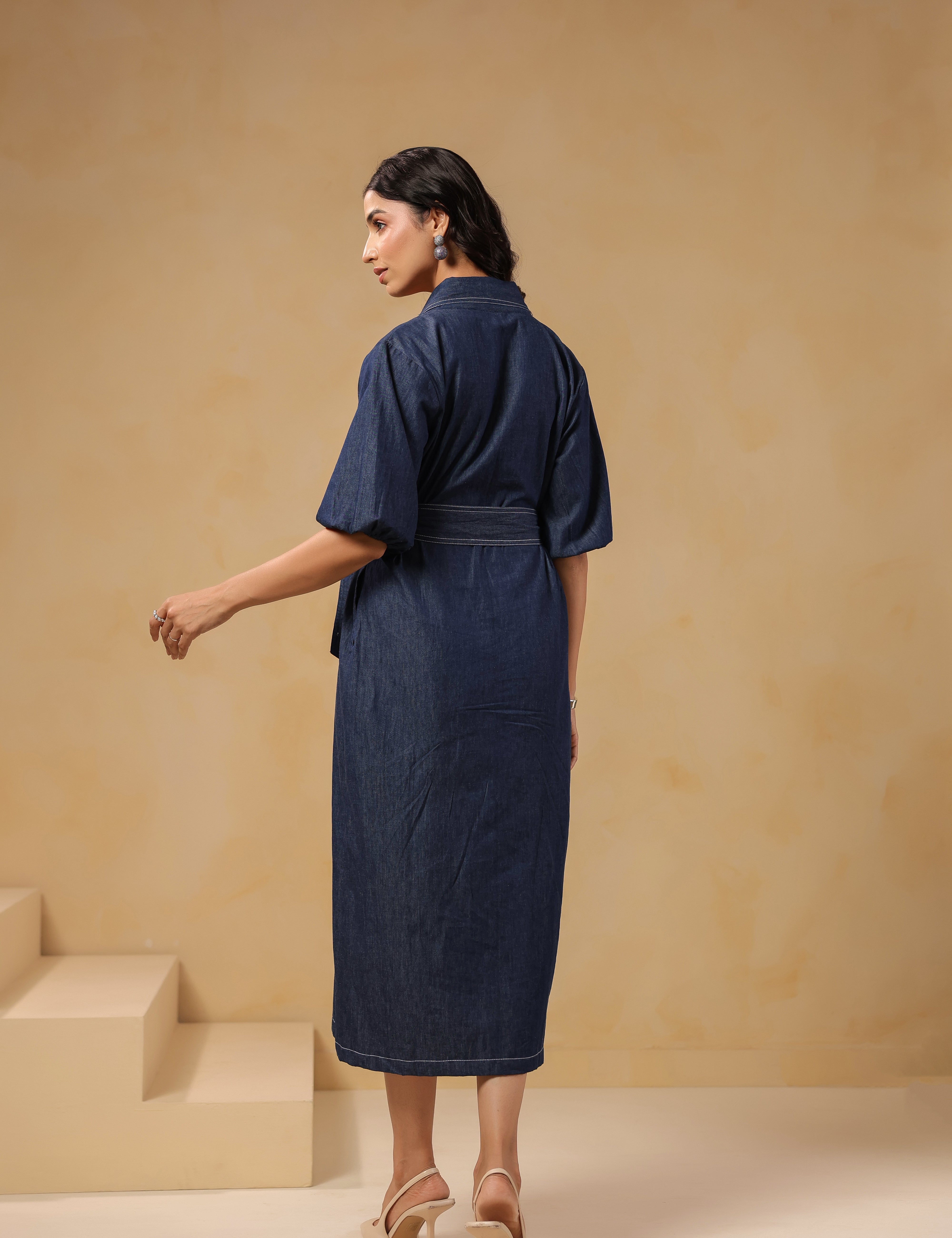 Back view of Aviary Belted Midi Dress in blue denim