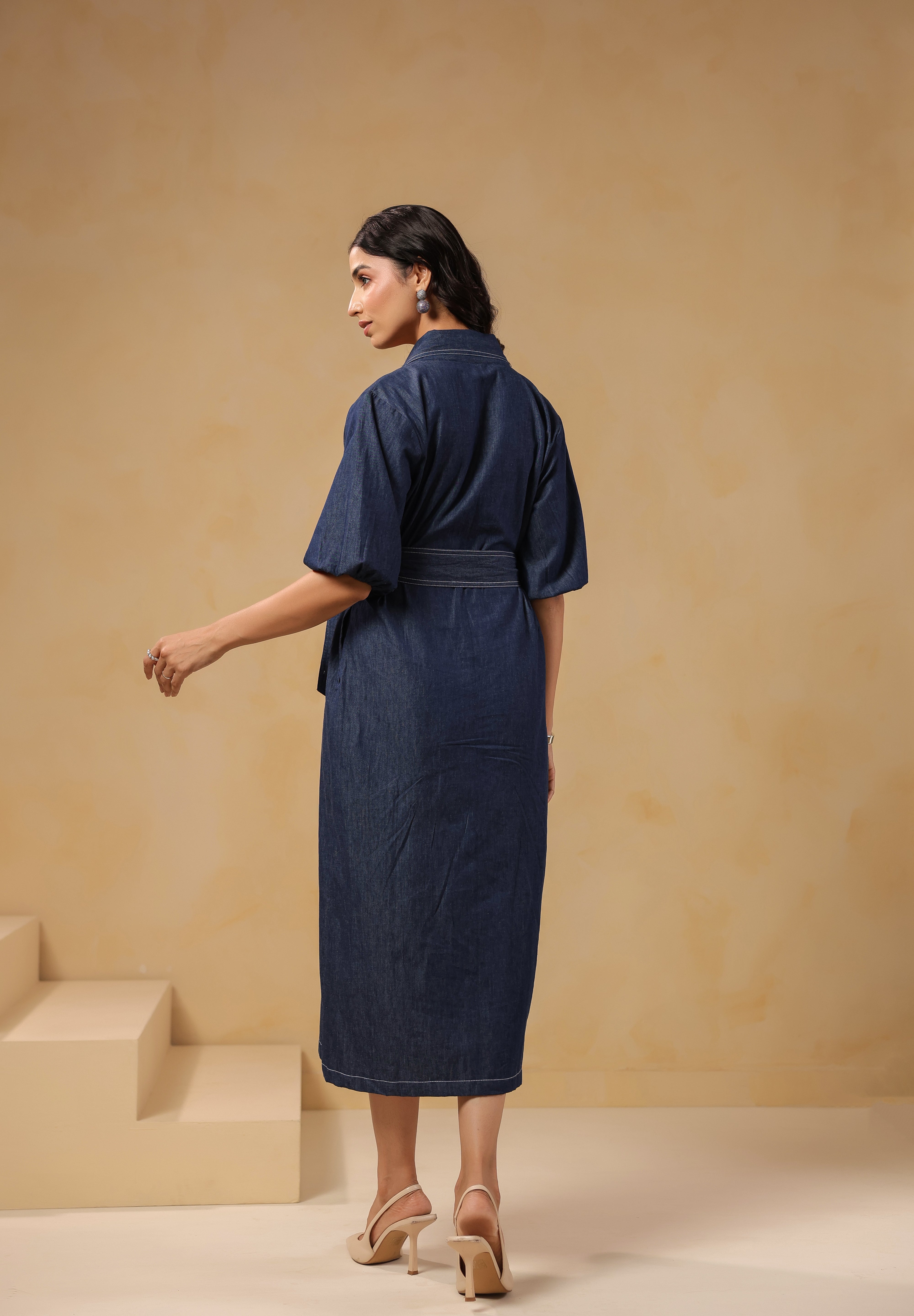 Back view of Aviary Belted Midi Dress in blue denim