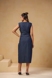 Back view of Bloom Trail Button Dress in breathable denim with floral hem embroidery
