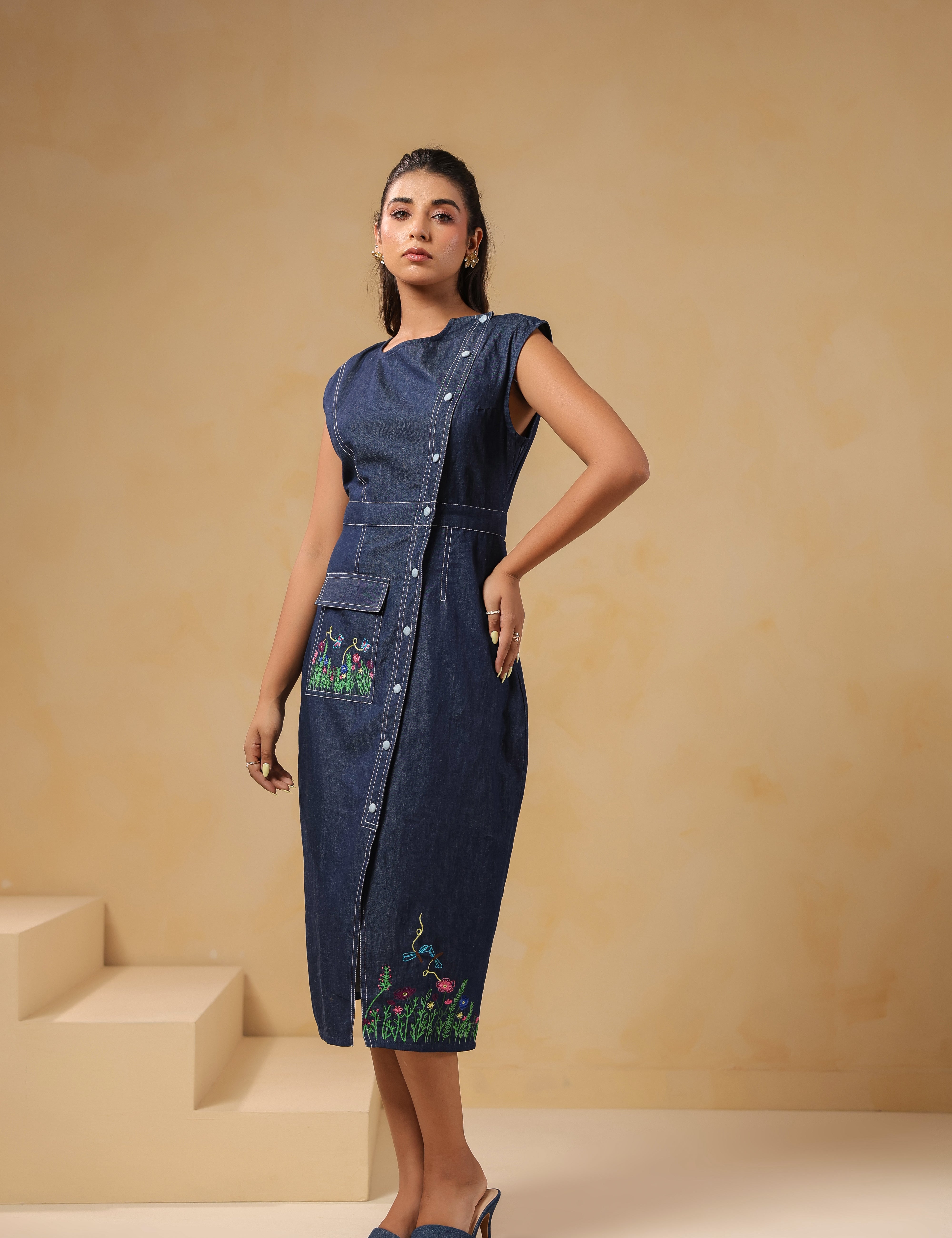 Front view of Bloom Trail Button Dress with floral embroidery and functional button-down design