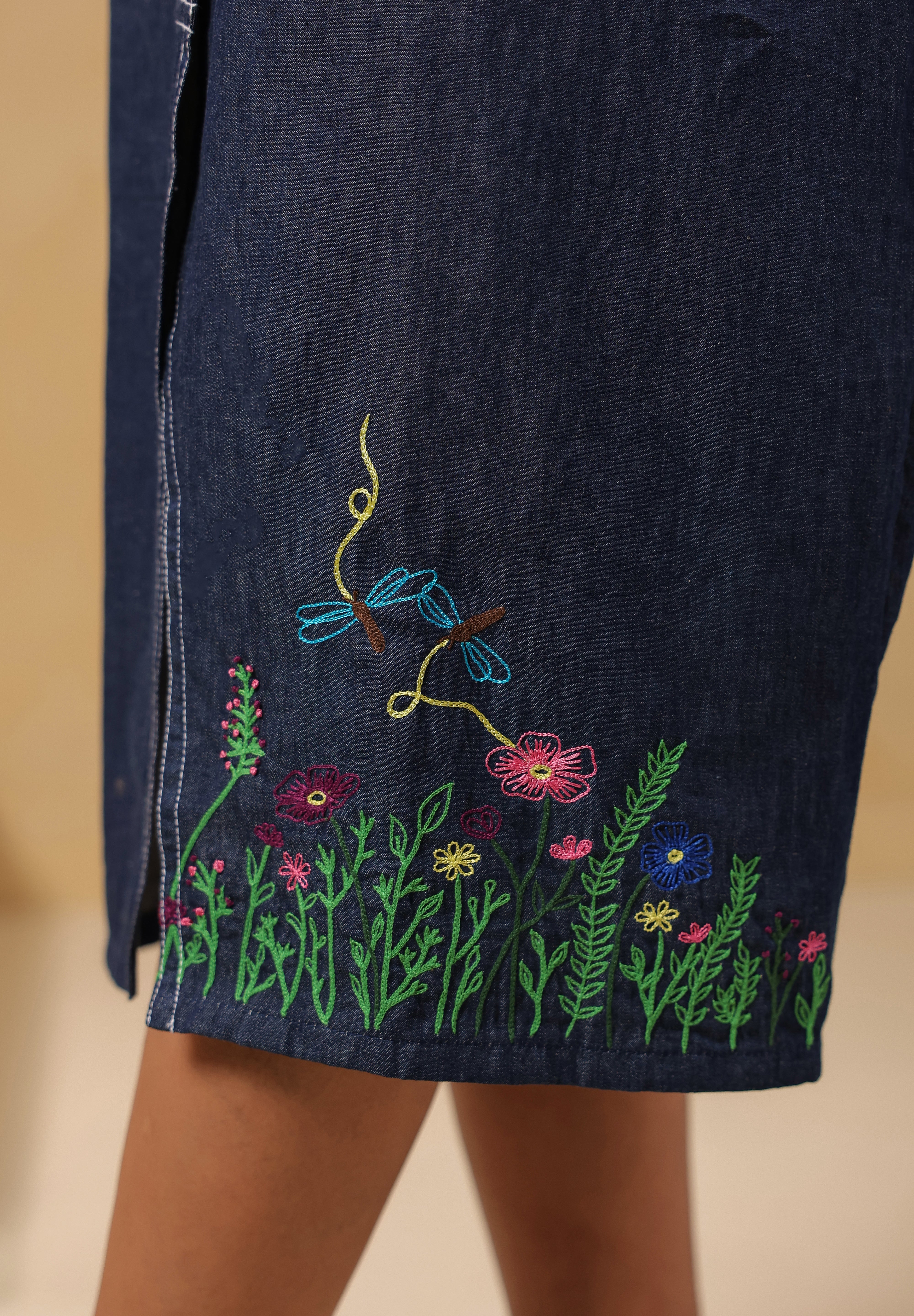 Floral embroidery detail on Bloom Trail Button Dress hem and pocket