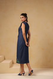 Side-back view of Bloom Trail Button Dress showing tailored fit and asymmetric button line