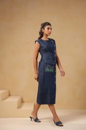 Side view of Bloom Trail Button Dress highlighting waistline fit and embroidered pocket