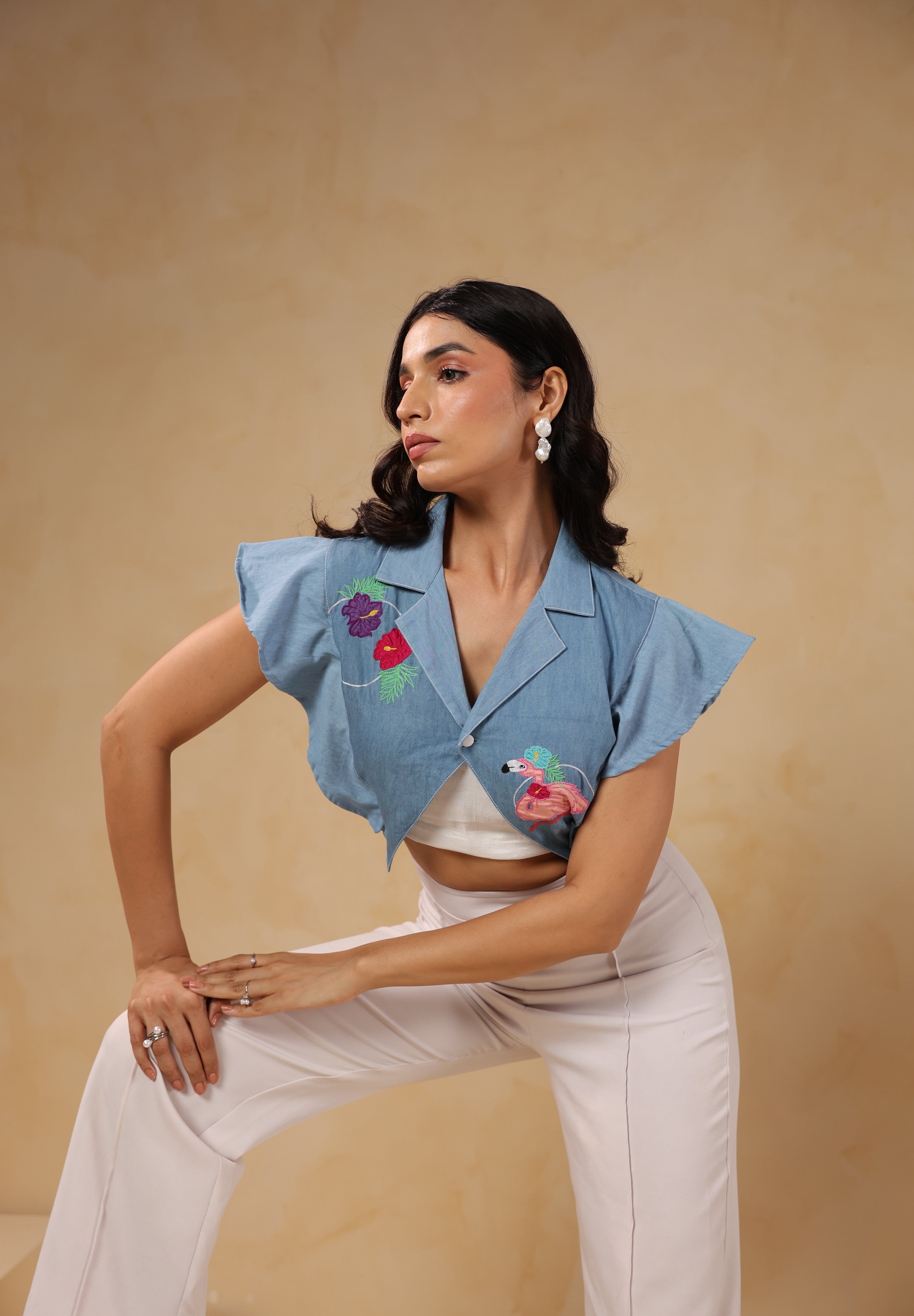 Angled view of Flaminglow Crop Top showing sleeve details