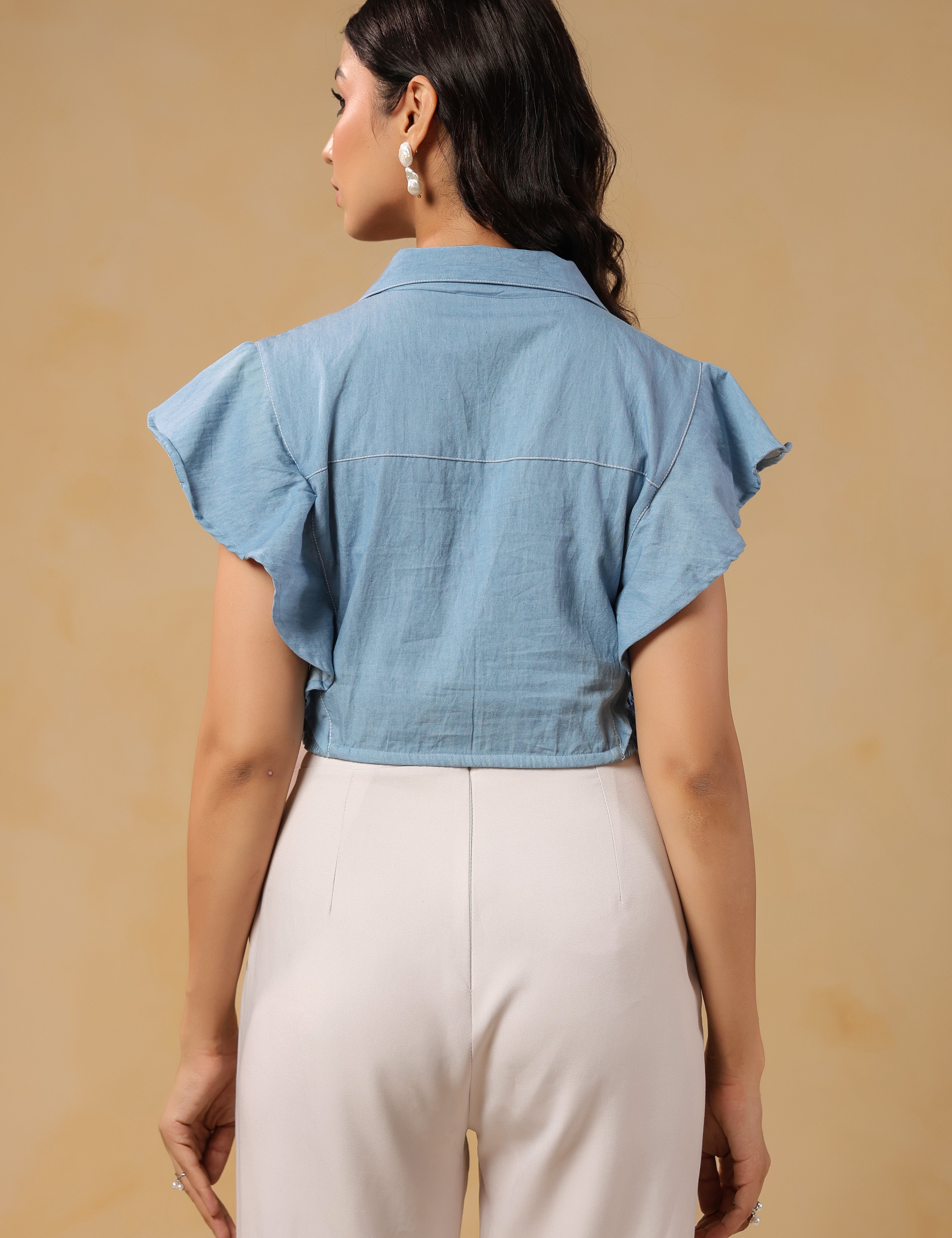 Back view of Flaminglow Crop Top showcasing flutter sleeves