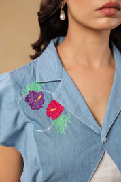 Close-up of vibrant floral embroidery on Flaminglow Crop Top