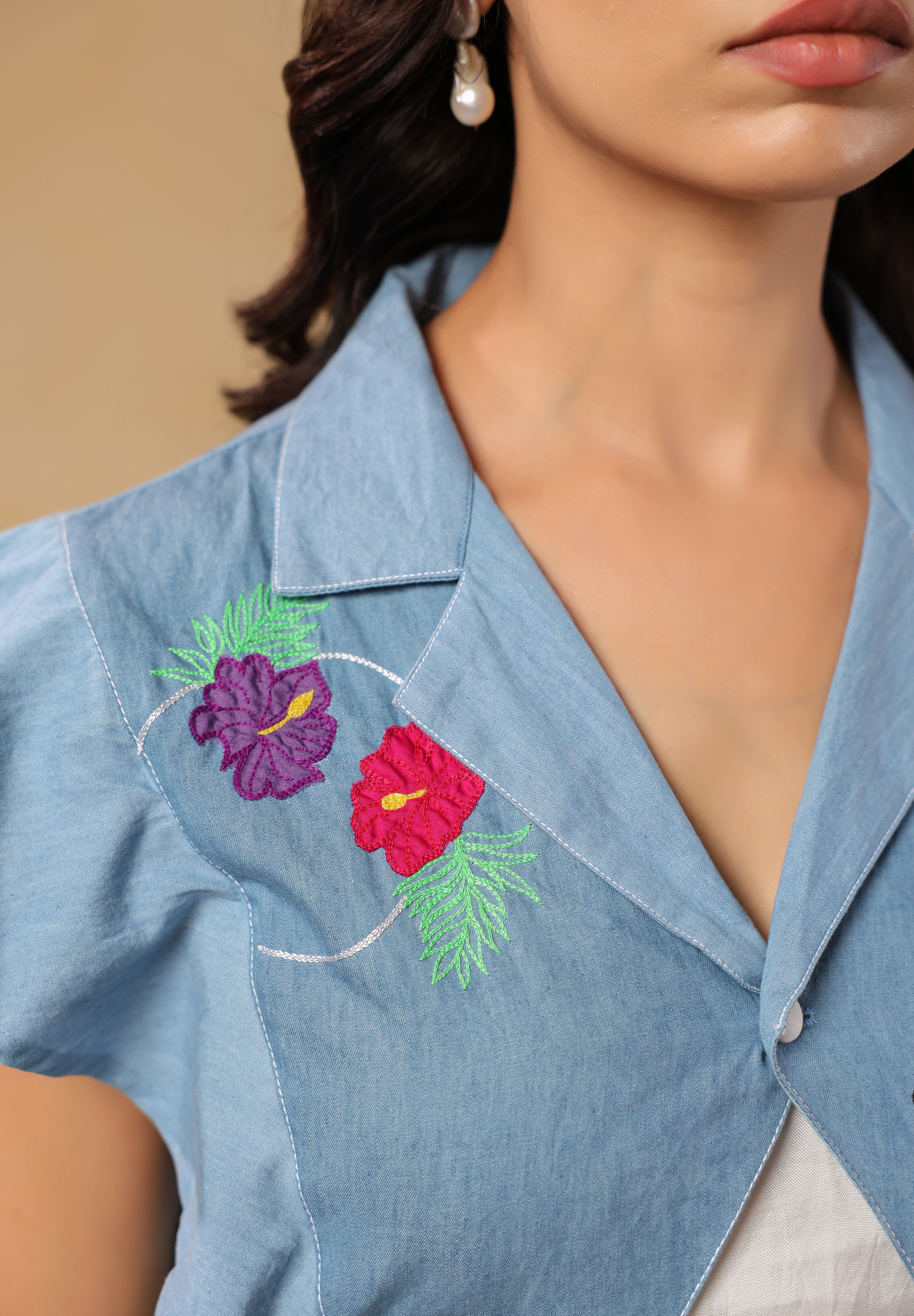 Close-up of vibrant floral embroidery on Flaminglow Crop Top