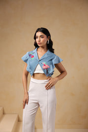Model wearing Flaminglow Crop Top with flamingo embroidery, front view