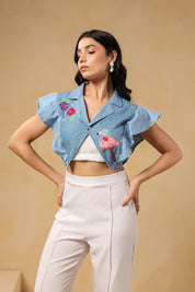 Side profile of Flaminglow Crop Top with tropical floral embroidery