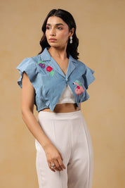 Flaminglow Crop Top styled with white high-waist trousers