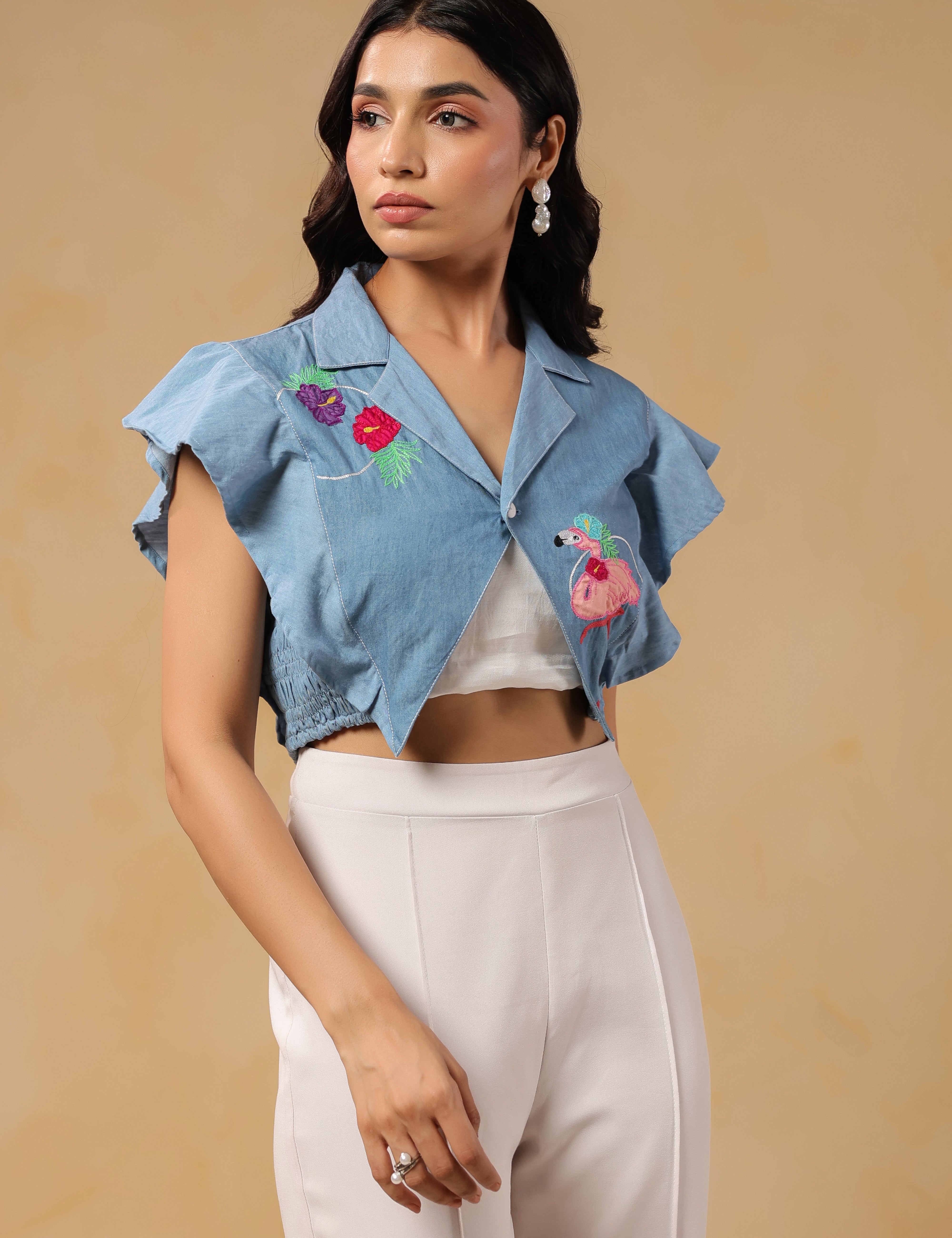 Flaminglow Crop Top styled with white high-waist trousers