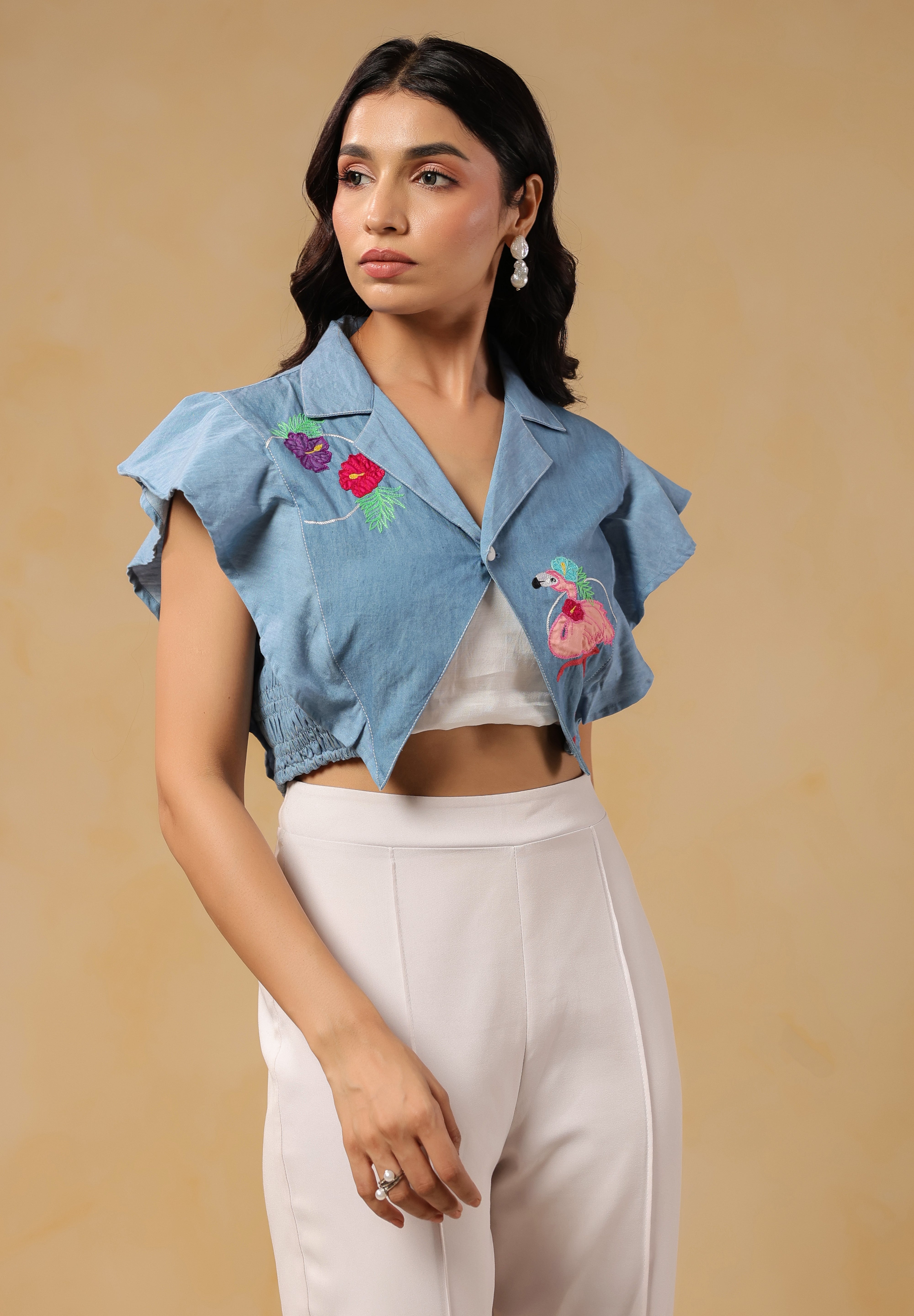 Flaminglow Crop Top styled with white high-waist trousers