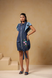 Front view of Ridah's Florablock Zip Mini Dress in denim with colorful floral embroidery and layered flutter sleeves