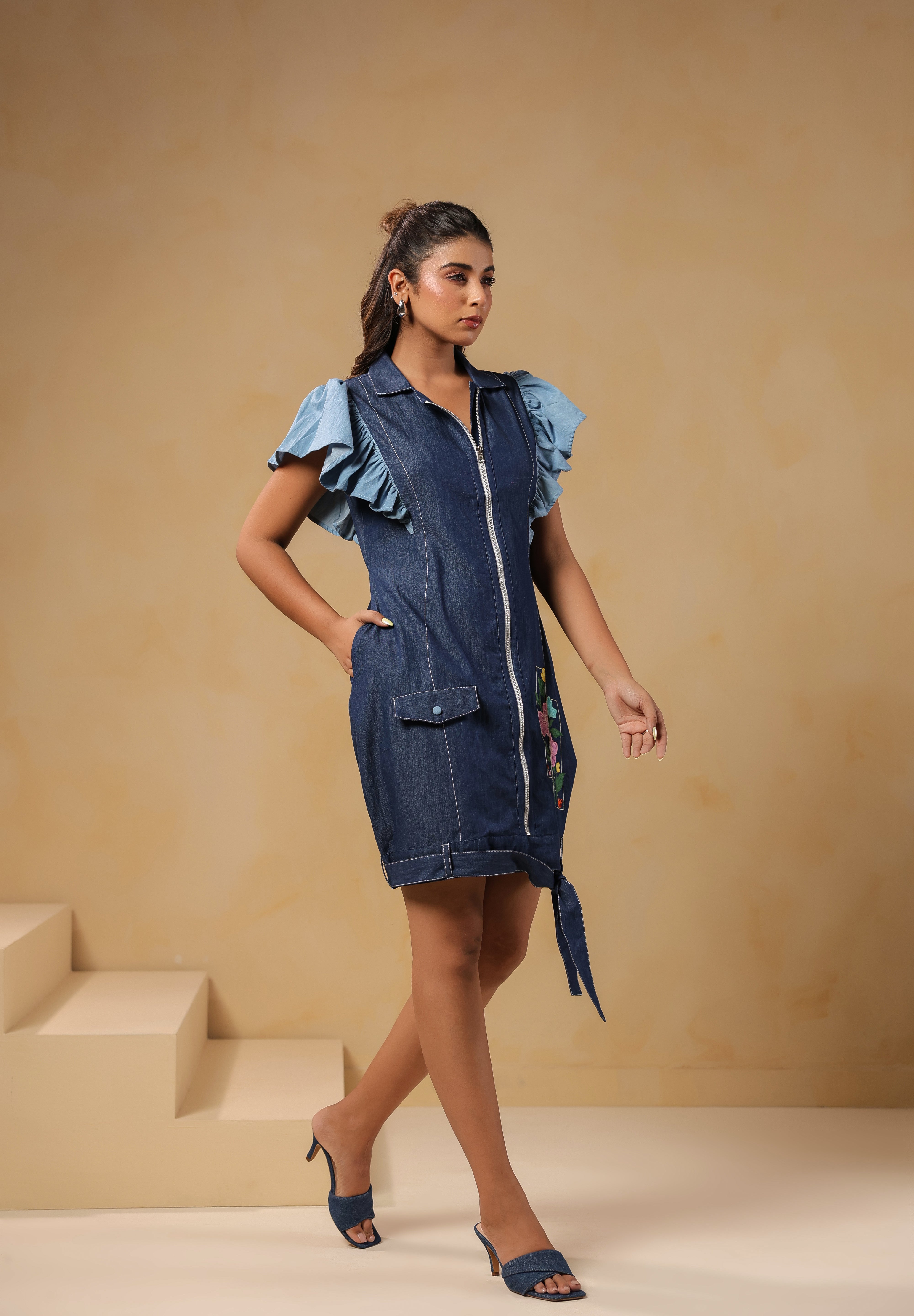 Angled front view of the Florablock Zip Mini Dress showcasing flattering seams and embroidery placement