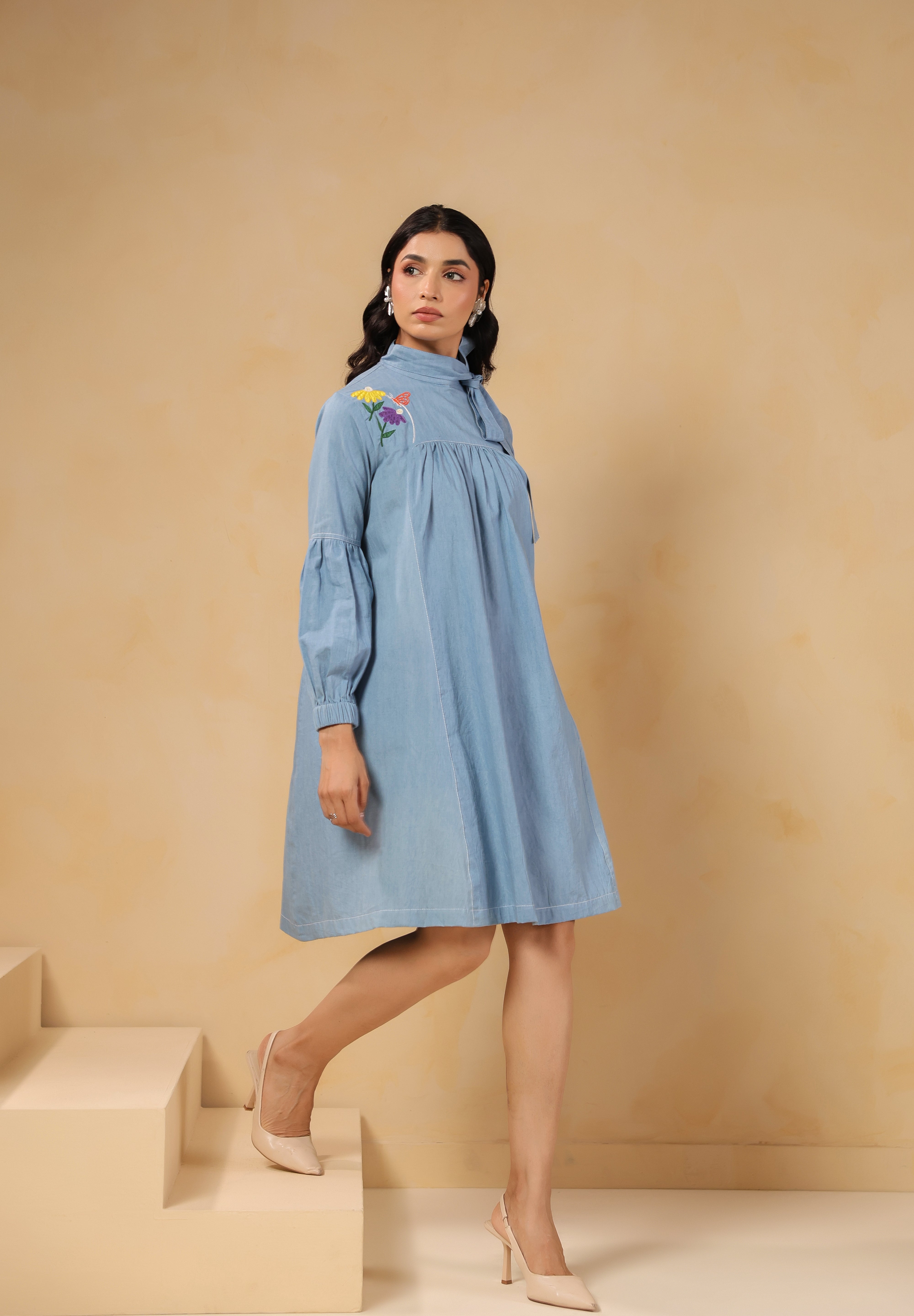 Side profile of Floraverse Tie Neck Dress in lightweight denim