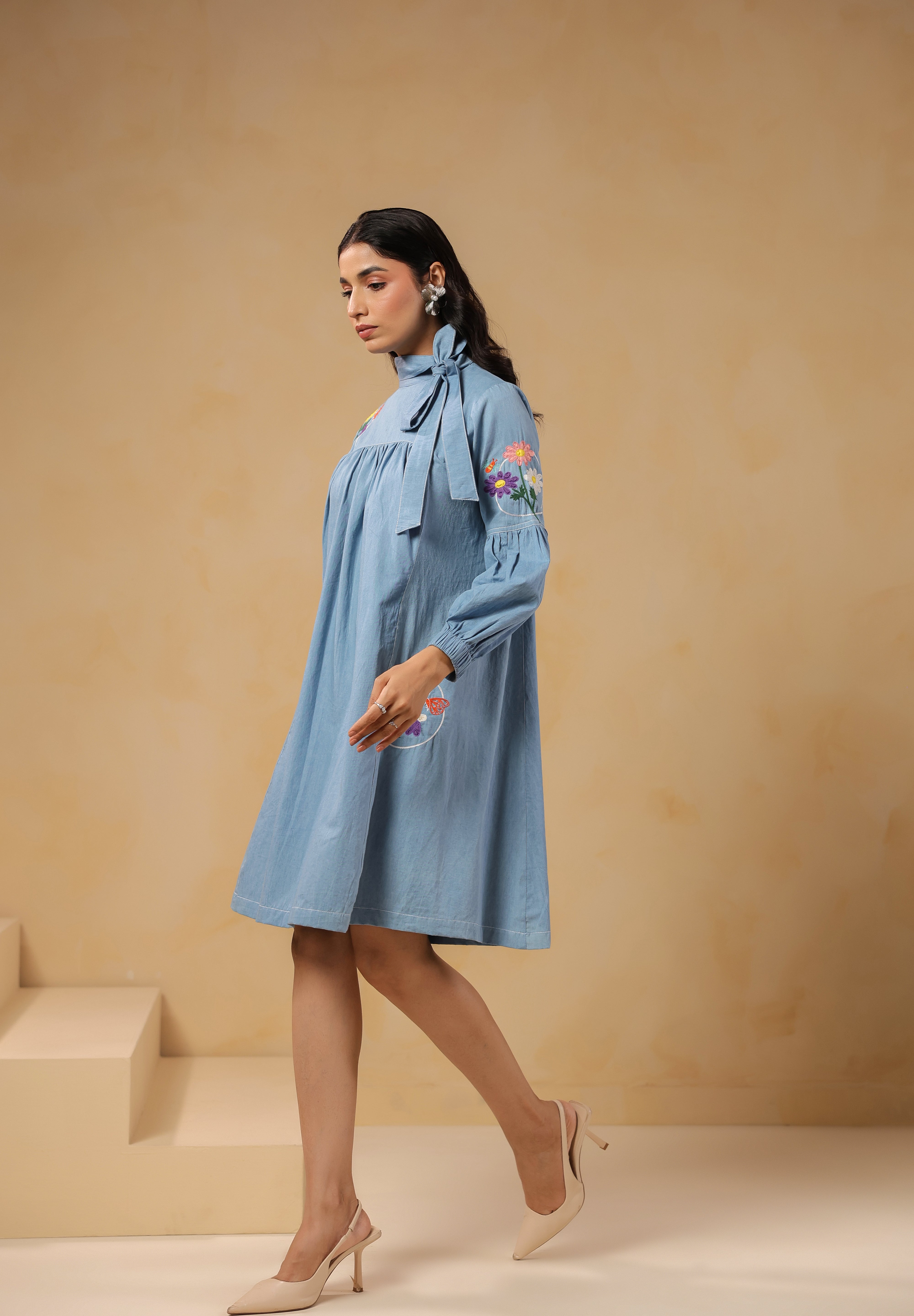 Side profile of Floraverse Tie Neck Dress in lightweight denim