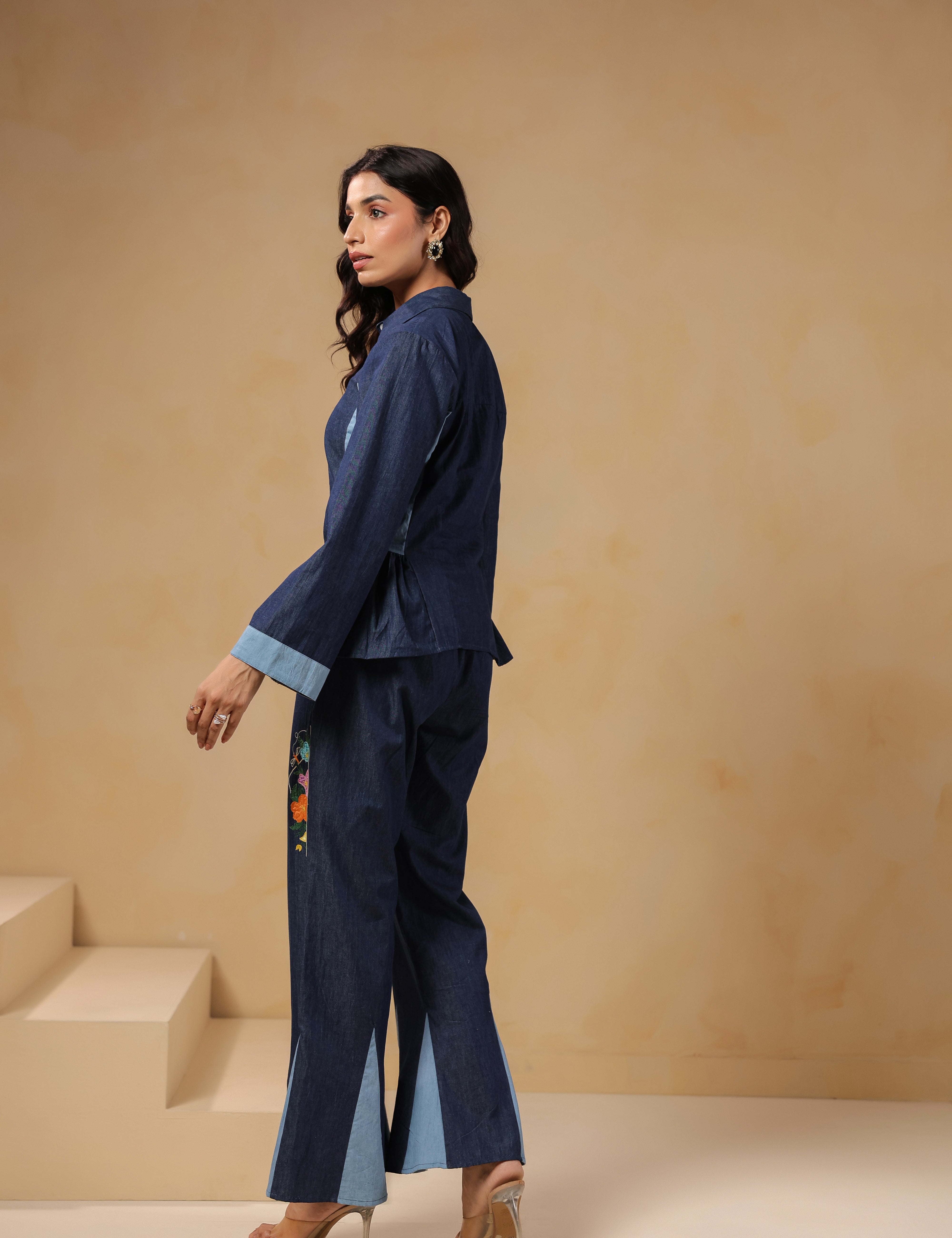 Ridah Geo Flare Coord Set – Back view of denim co-ord with flared trousers and peplum shirt
