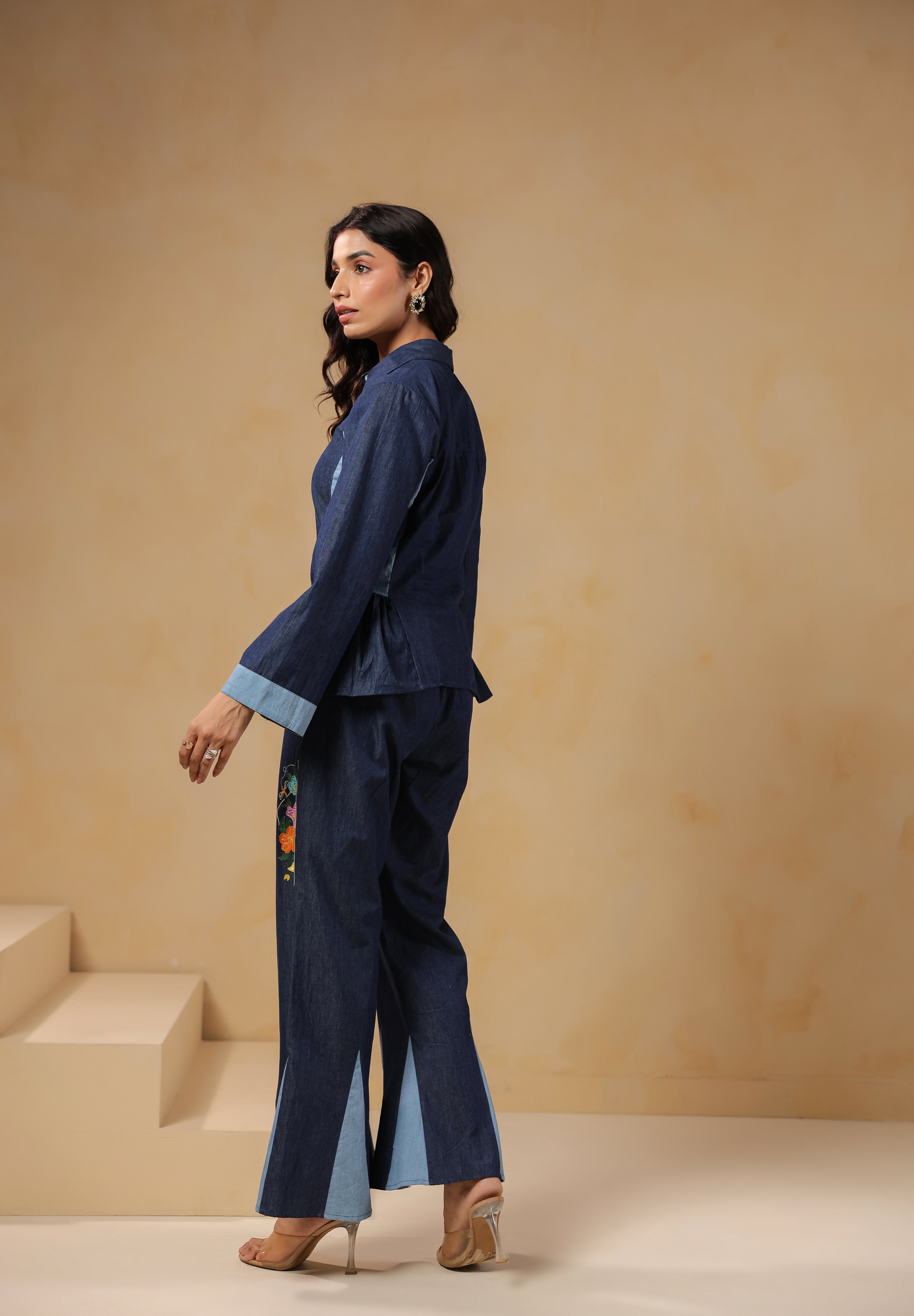 Ridah Geo Flare Coord Set – Back view of denim co-ord with flared trousers and peplum shirt