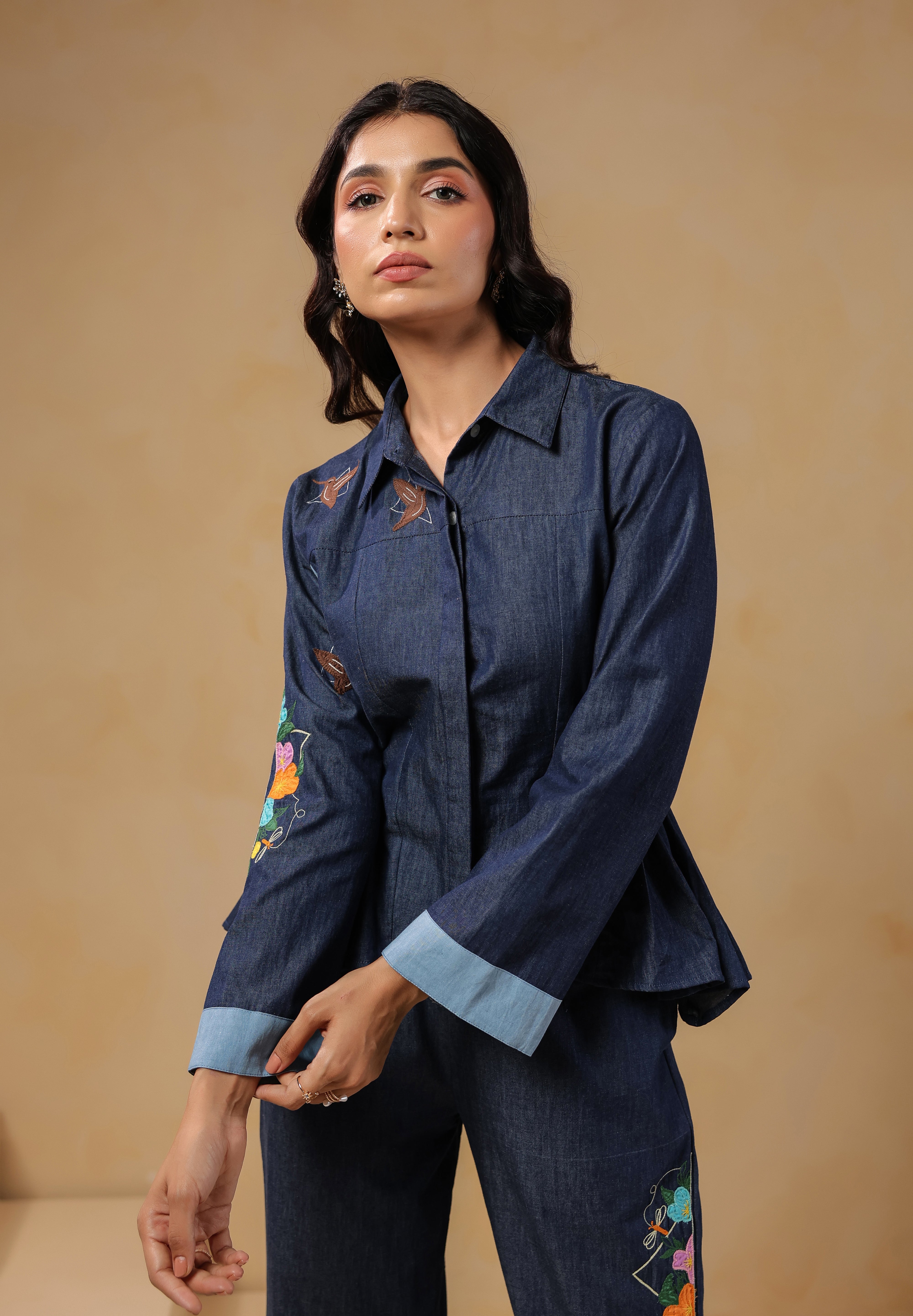 Geo Flare Coord Set – Close-up of denim shirt with floral embroidery and tailored cuffs