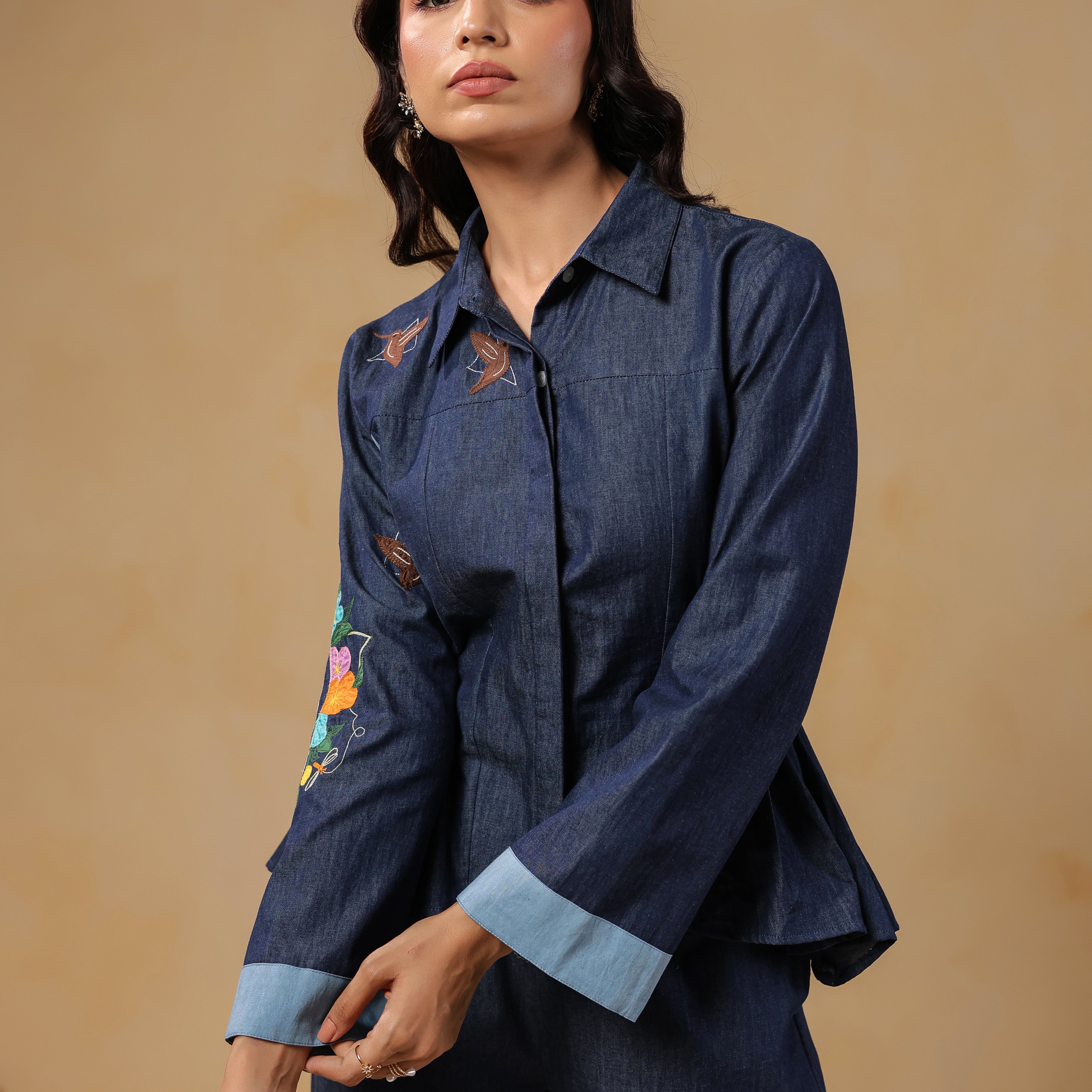 Geo Flare Coord Set – Close-up of denim shirt with floral embroidery and tailored cuffs