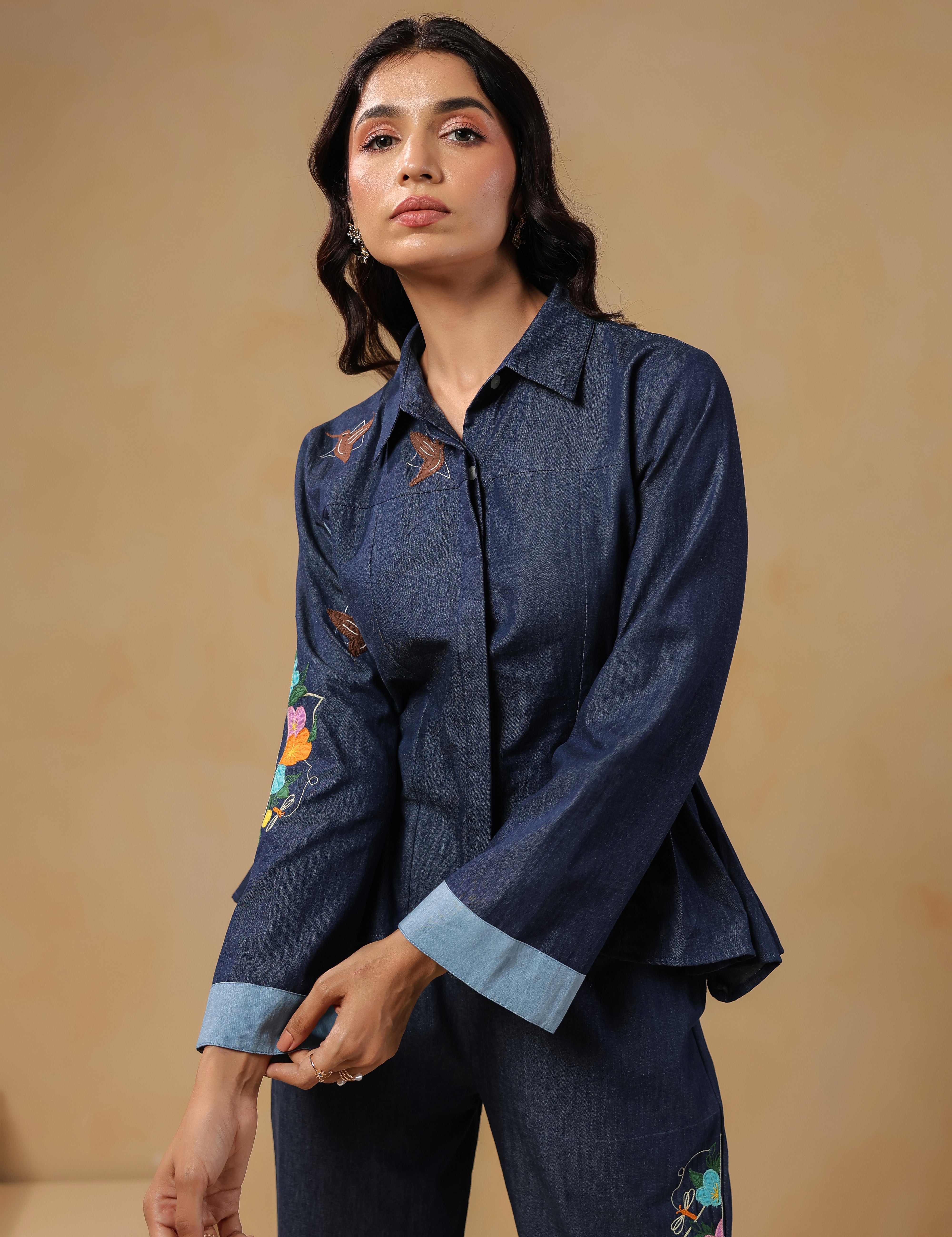 Geo Flare Coord Set – Close-up of denim shirt with floral embroidery and tailored cuffs