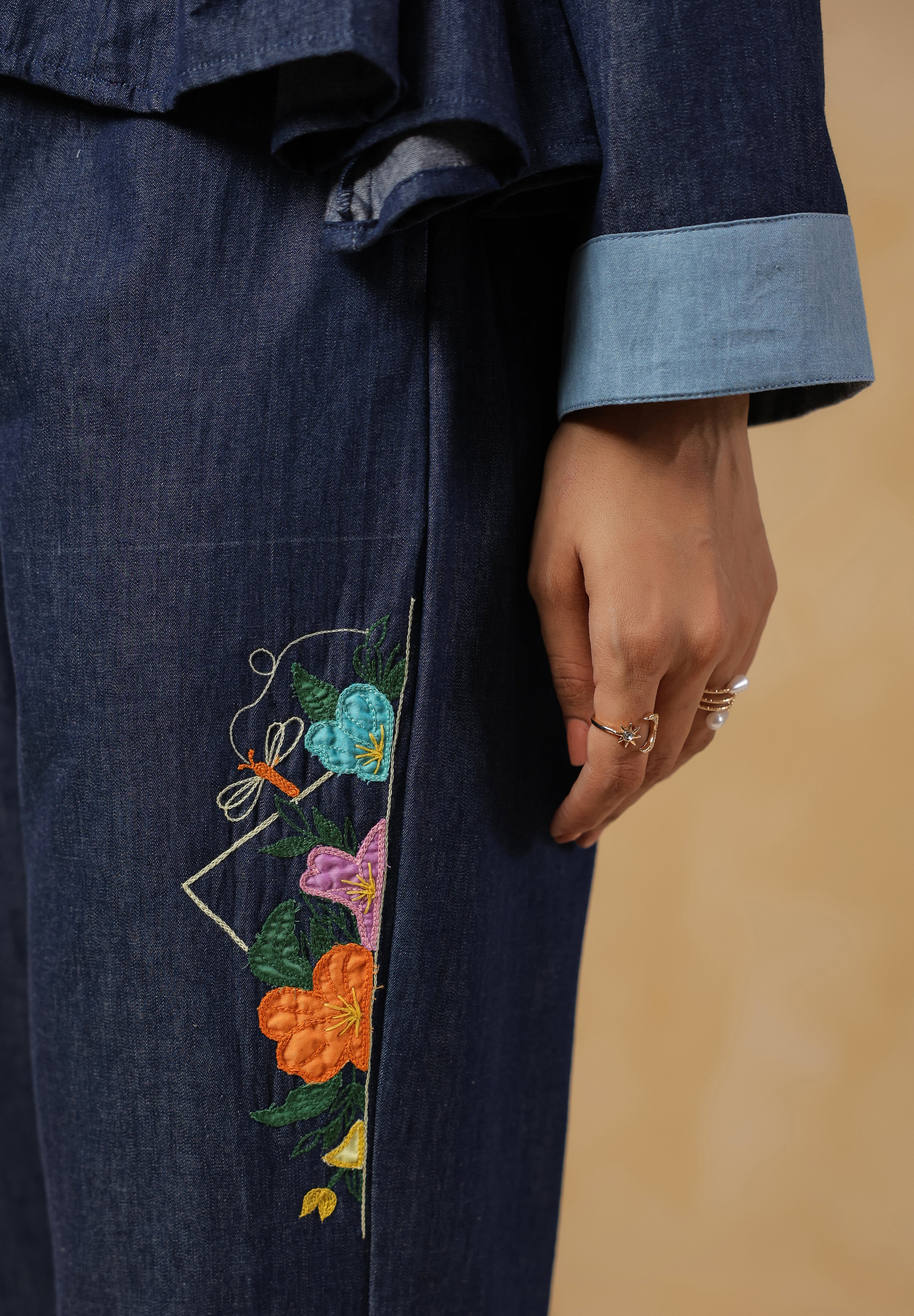 Geo Flare Coord Set – Floral embroidery close-up on denim straight pants