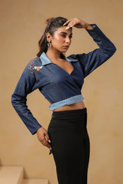 Statement look of Hexabee Wrap Top styled with black pants and geometric embroidery