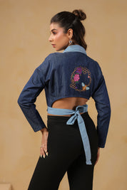 Back view of Hexabee Wrap Top showcasing honeybee embroidery and tie-up detail