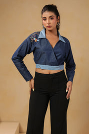 Front view of Hexabee Wrap Top with geometric honeycomb embroidery on shoulder