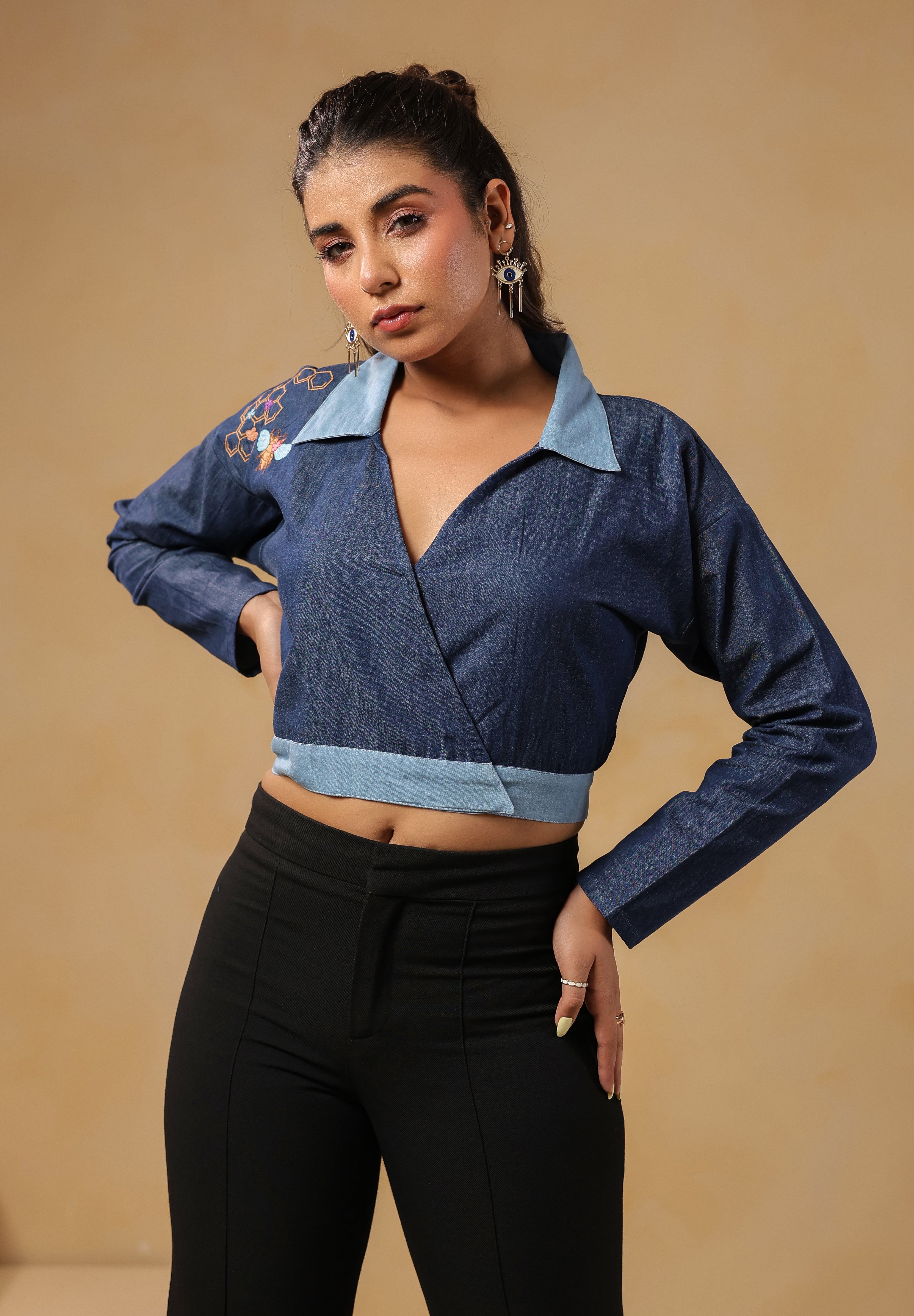 Hexabee Wrap Top in denim featuring a modern cropped silhouette and contrast collar