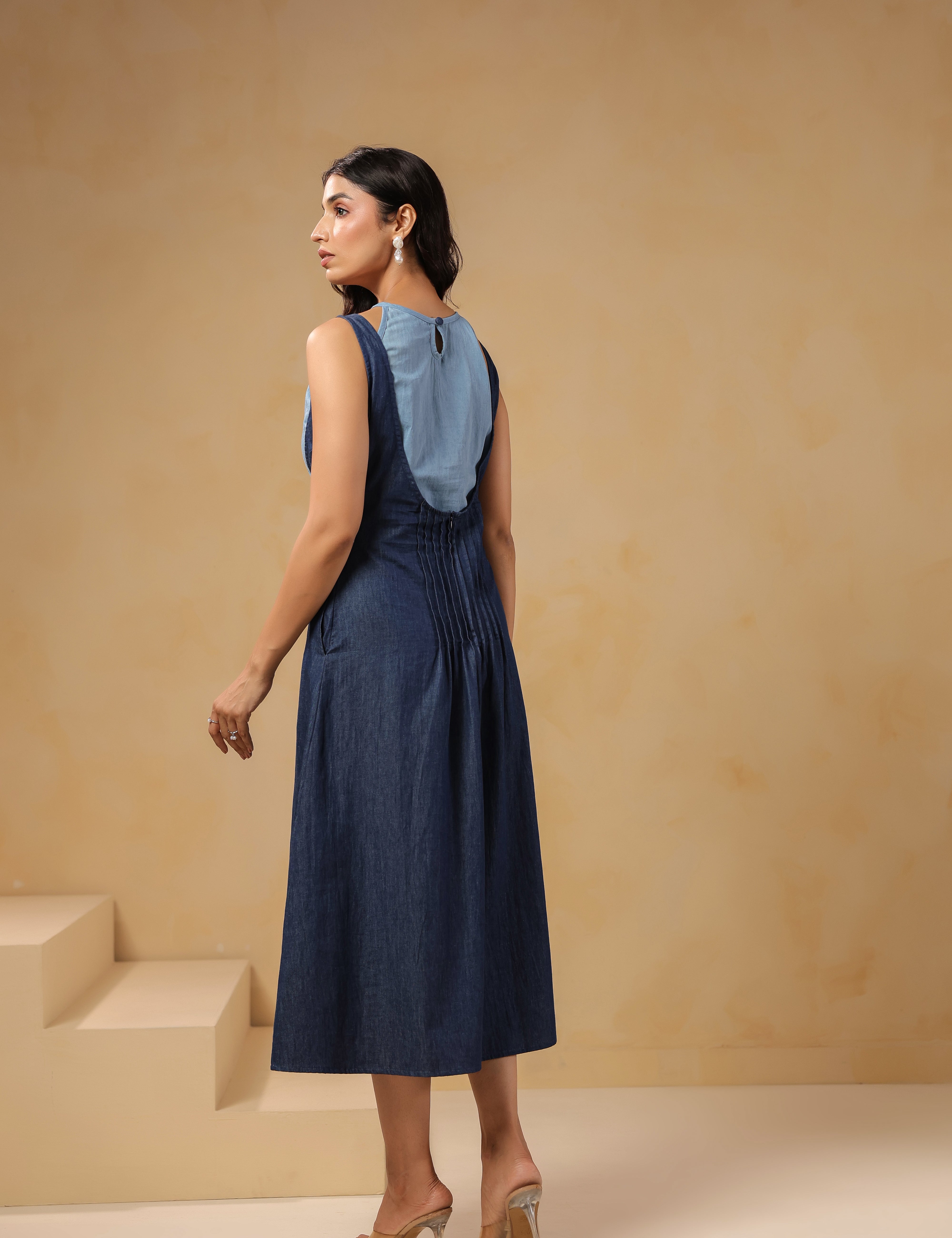 Ridah Honeybee Midi Dress – Back view of sleeveless denim midi with soft gathers