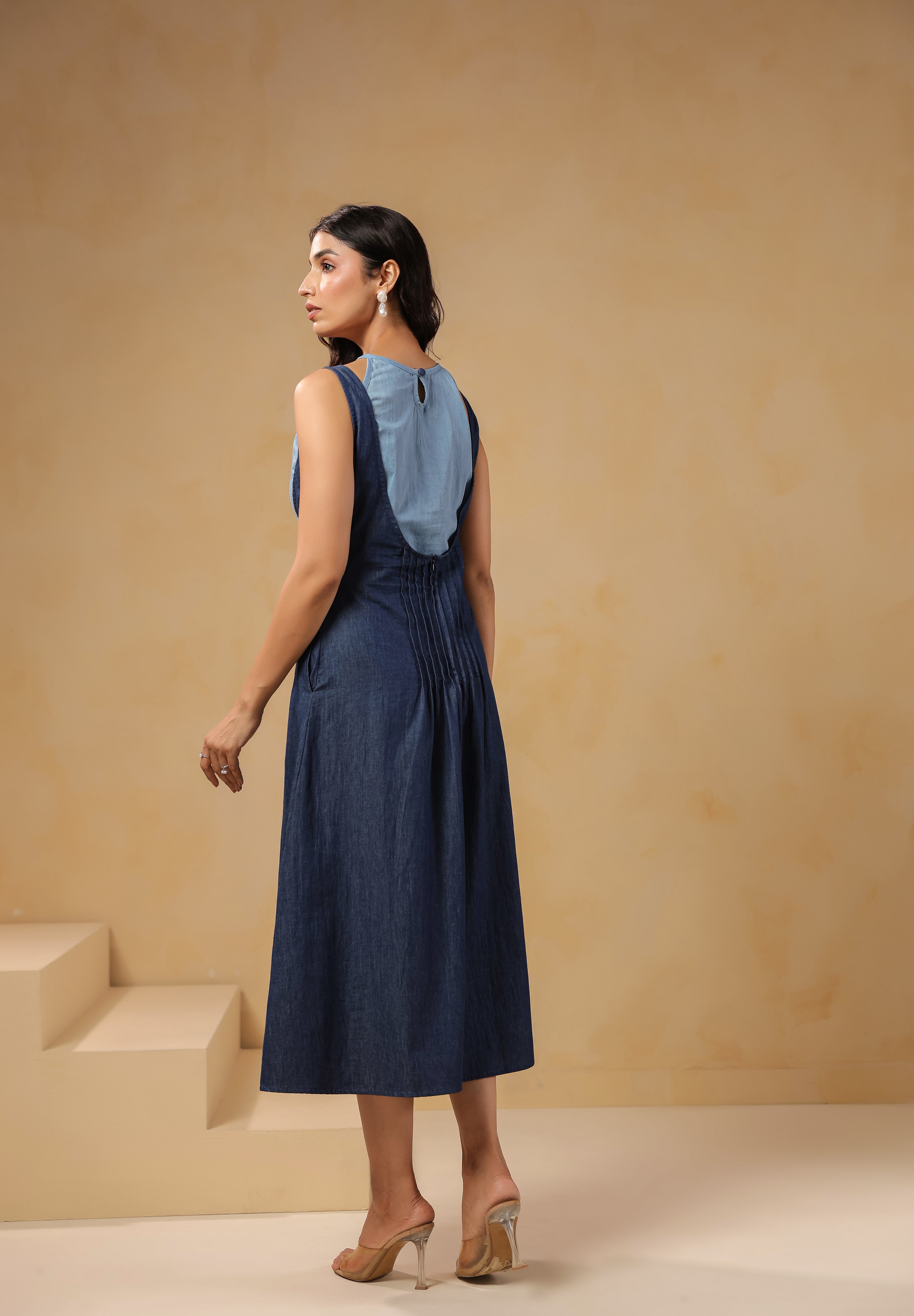 Ridah Honeybee Midi Dress – Back view of sleeveless denim midi with soft gathers