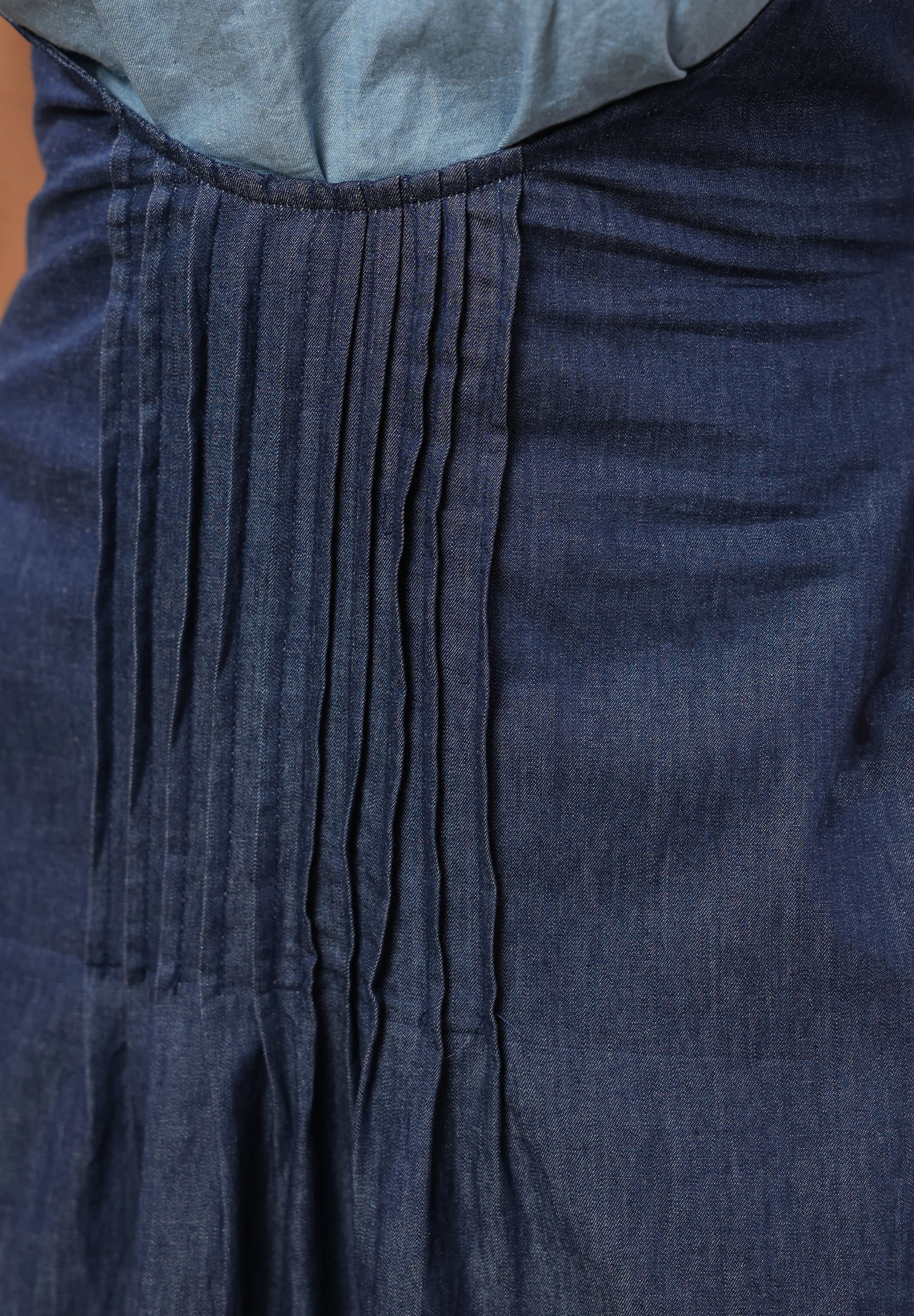 Honeybee Midi Dress – Close-up of fine pleated detailing on waistline