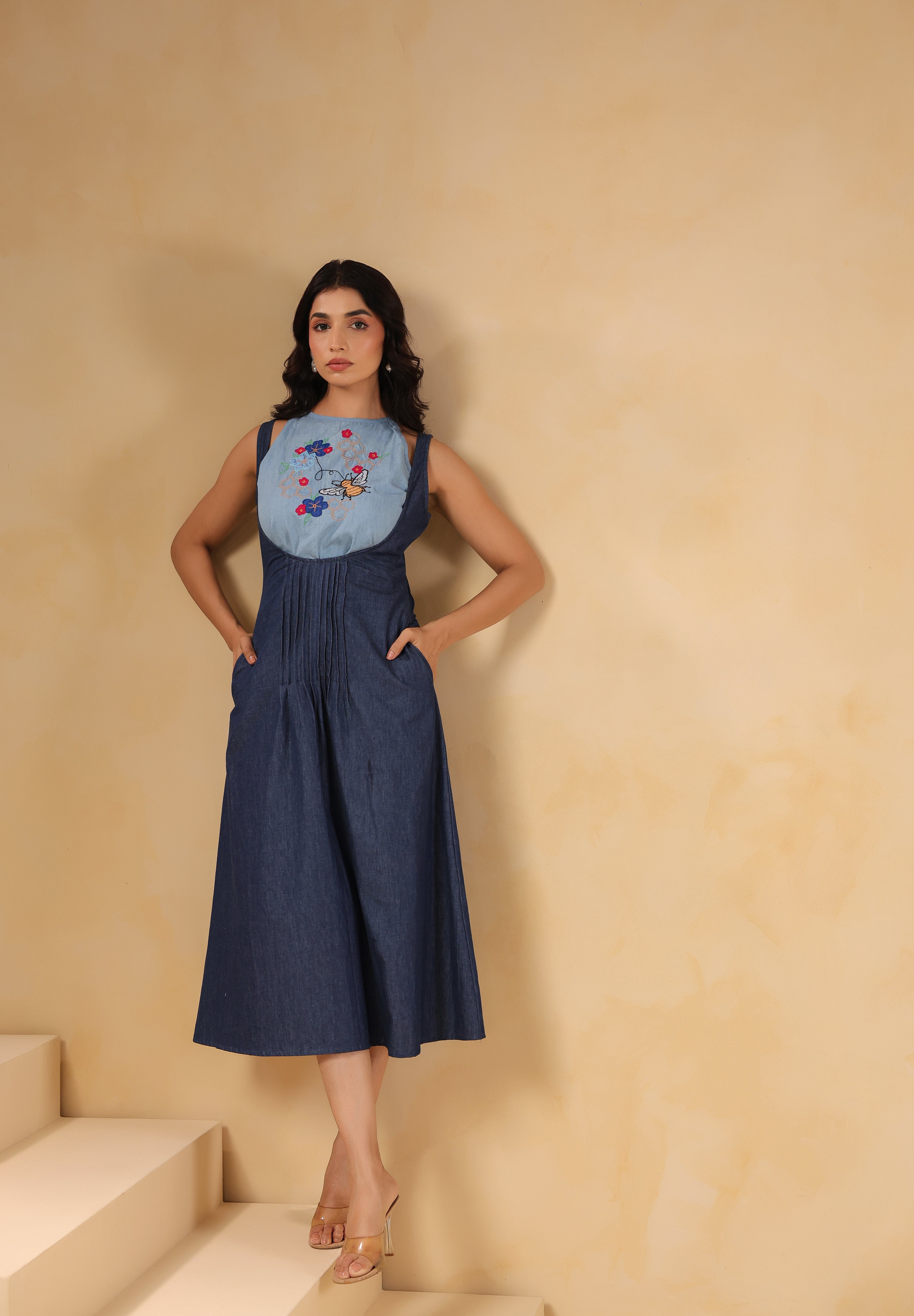 Stylish Honeybee Midi Dress – Side angle showing flowy denim fall and sleeveless cut
