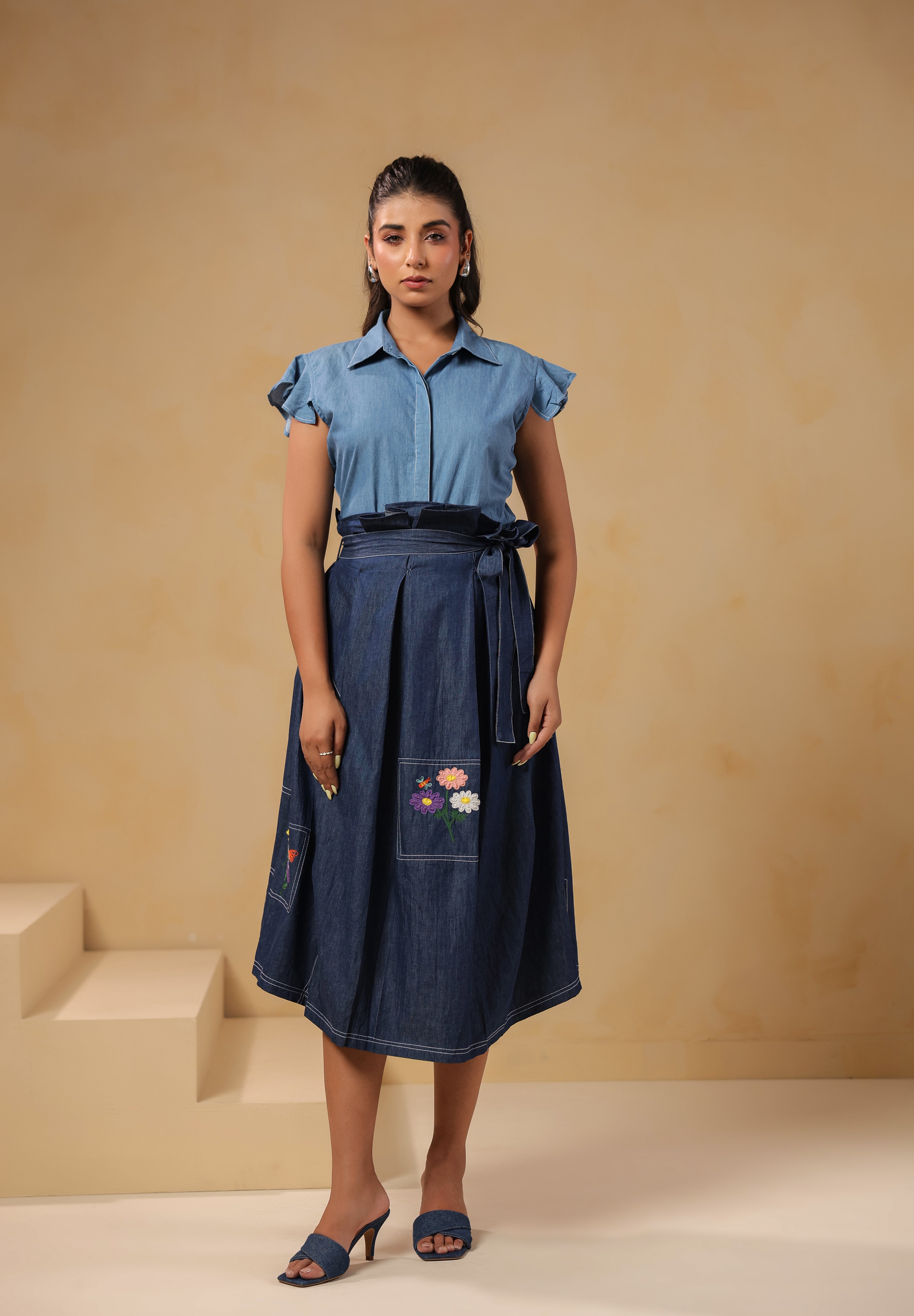 Full front look of Meadowflair Coord Set with structured flutter-sleeve top and botanical denim skirt — a casual yet elevated look for everyday charm.