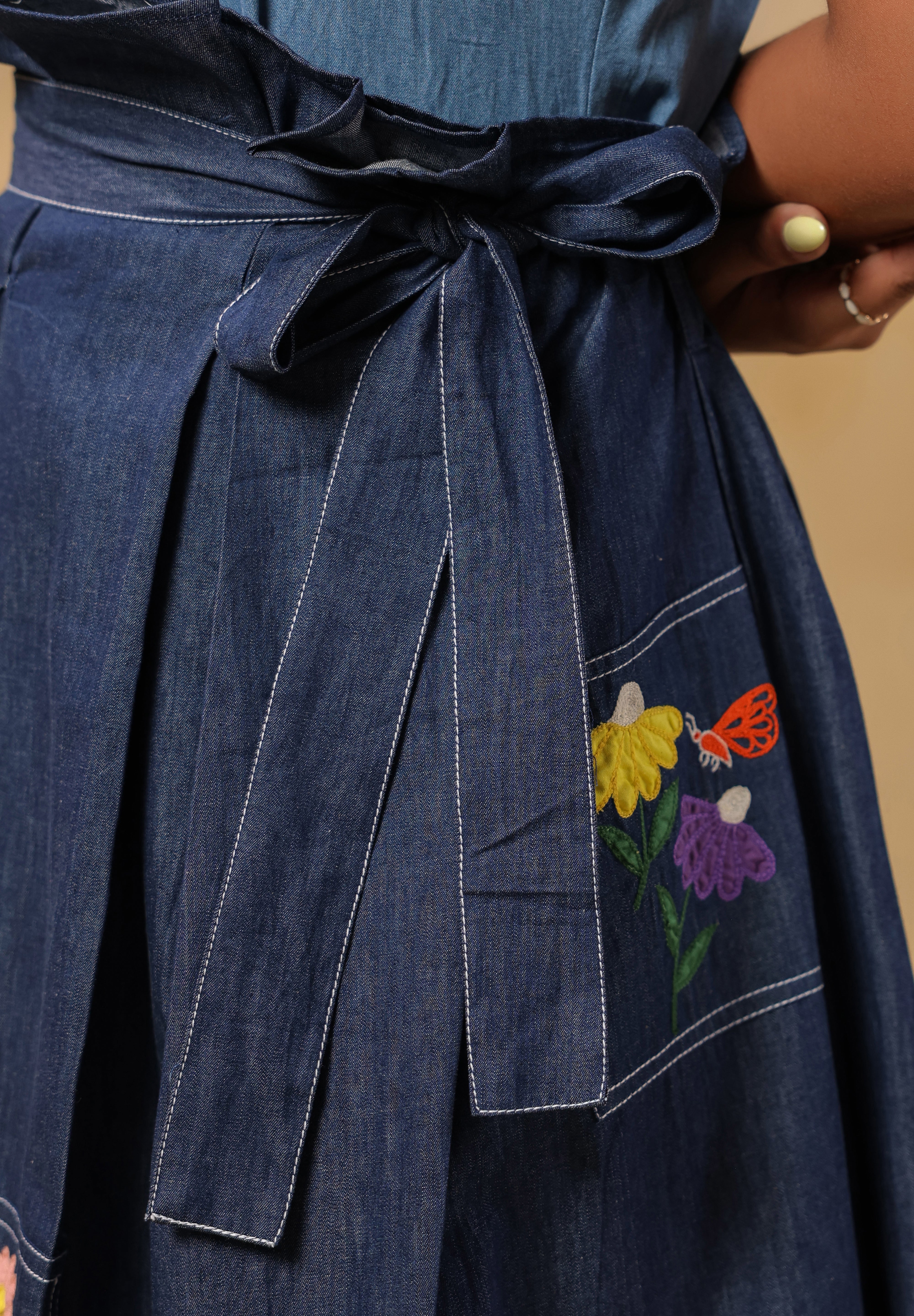 Detailed shot of ruffled waist belt and structured pleats — accentuating the Meadowflair Coord Set’s flattering silhouette.