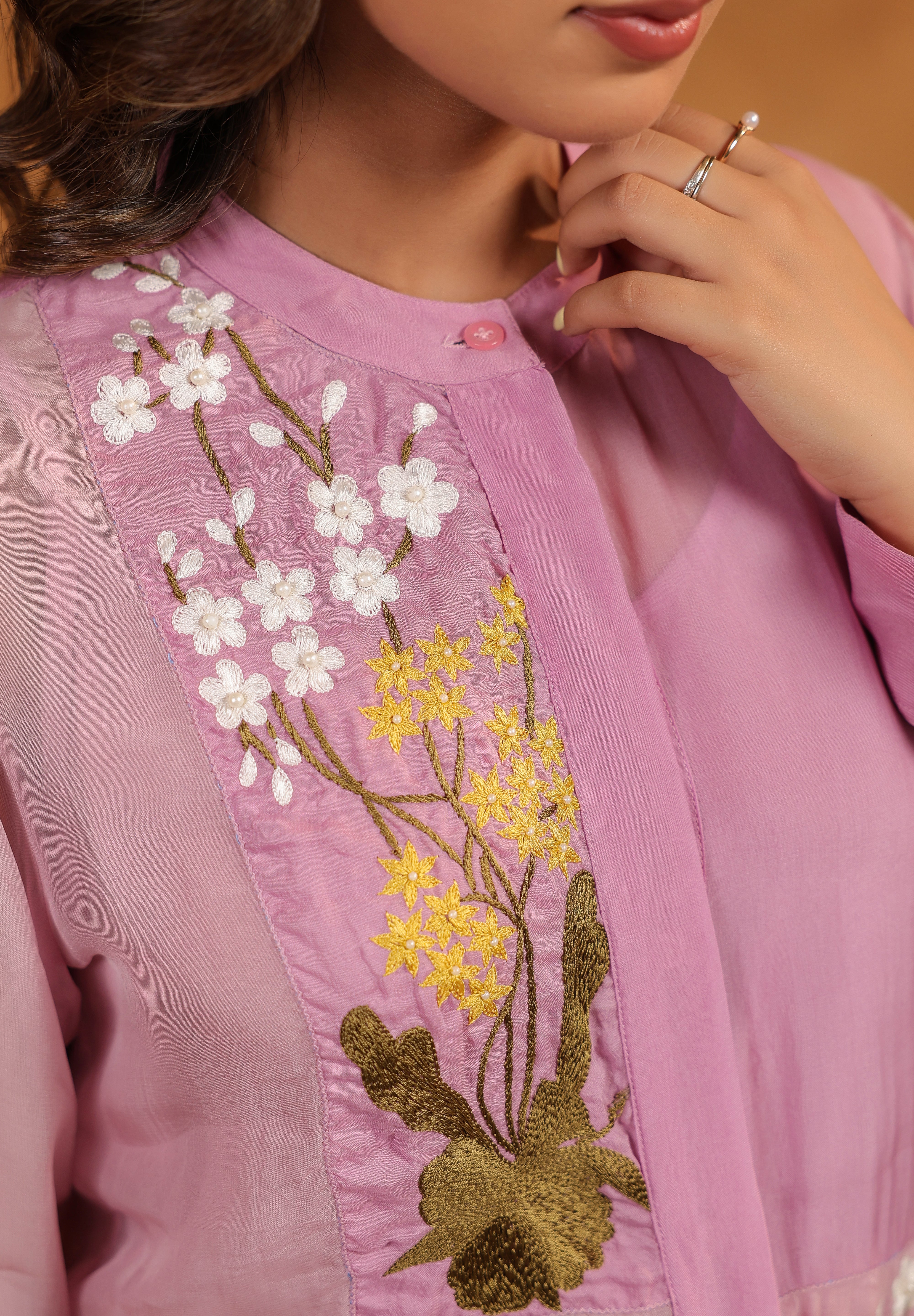 Detailed embroidery view of Orchid Bloom Panelled Set
