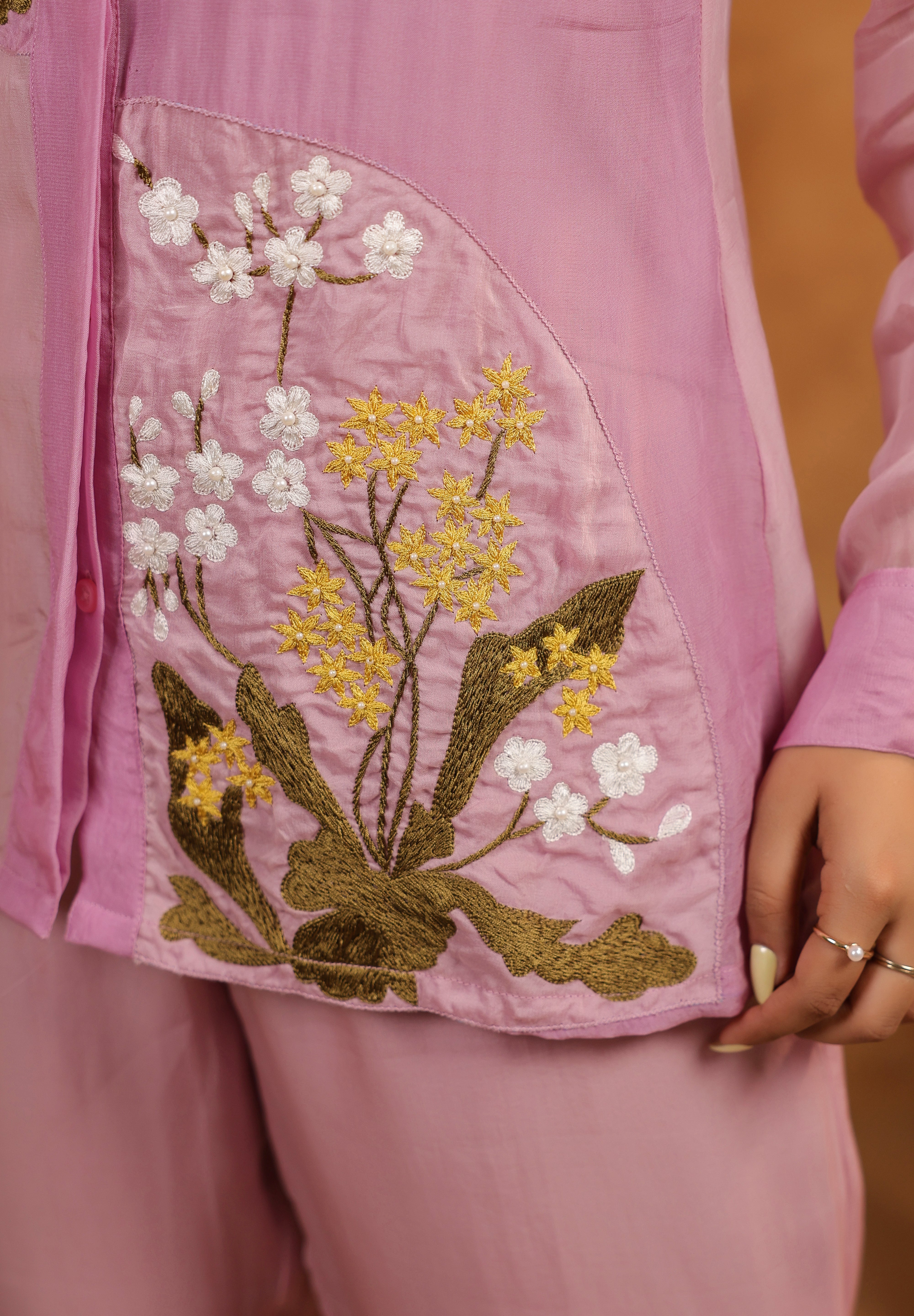 Detailed embroidery view of Orchid Bloom Panelled Set