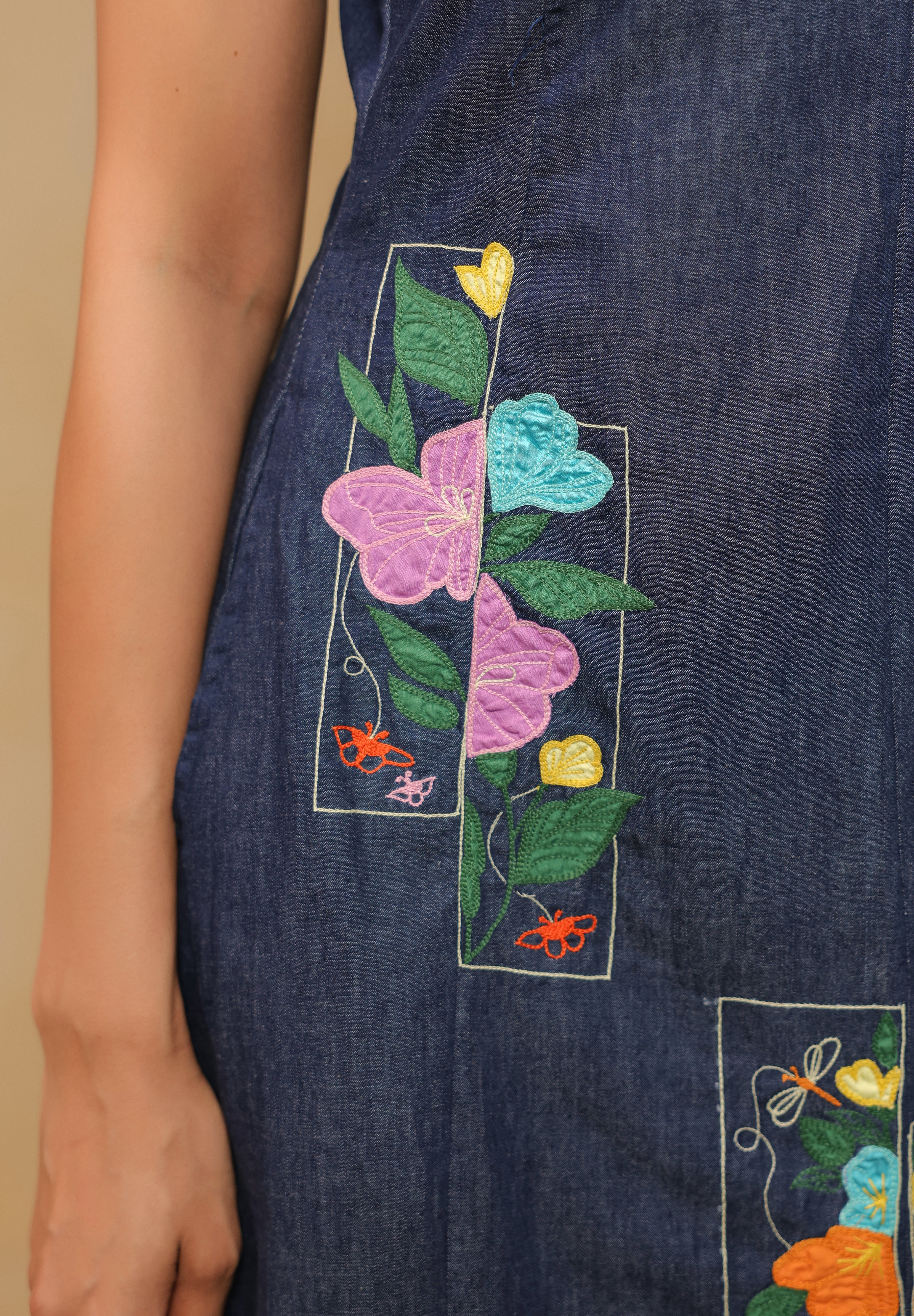 Side embroidery close-up of Rectaflora Midi Dress.