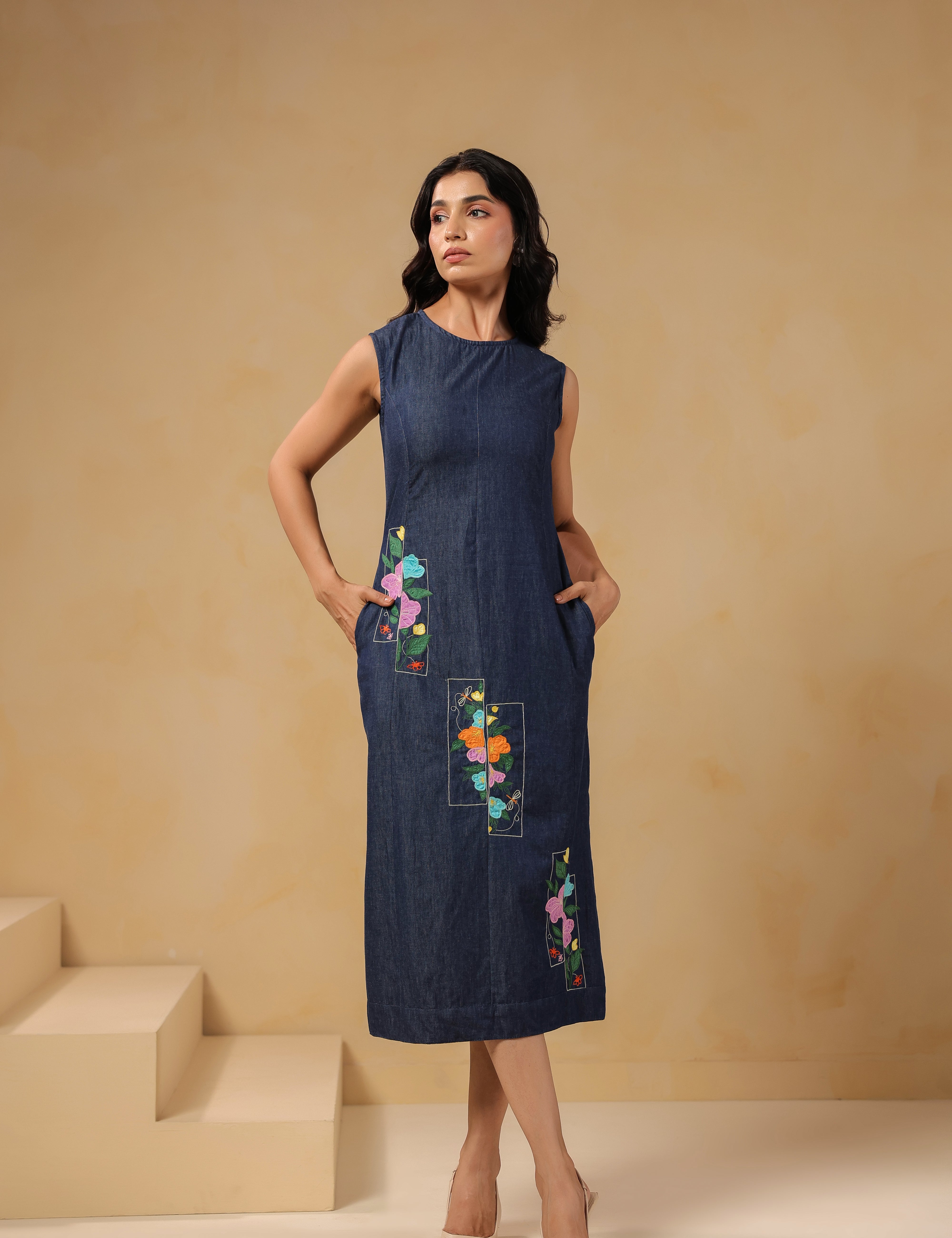 Front view of Rectaflora Panel Midi Dress with floral embroidery on denim.