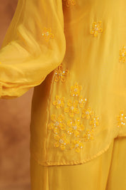 Natural moment showing the lightweight ease and floral accents of the Sunflare Organza Set.
