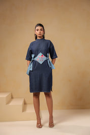 Front look of Tide & Ties Flamingo Dress featuring flamingo embroidery and denim belt ties