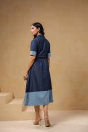 Back view of Woodland Muse Midi Dress with contrast cuff sleeves and flared hemline