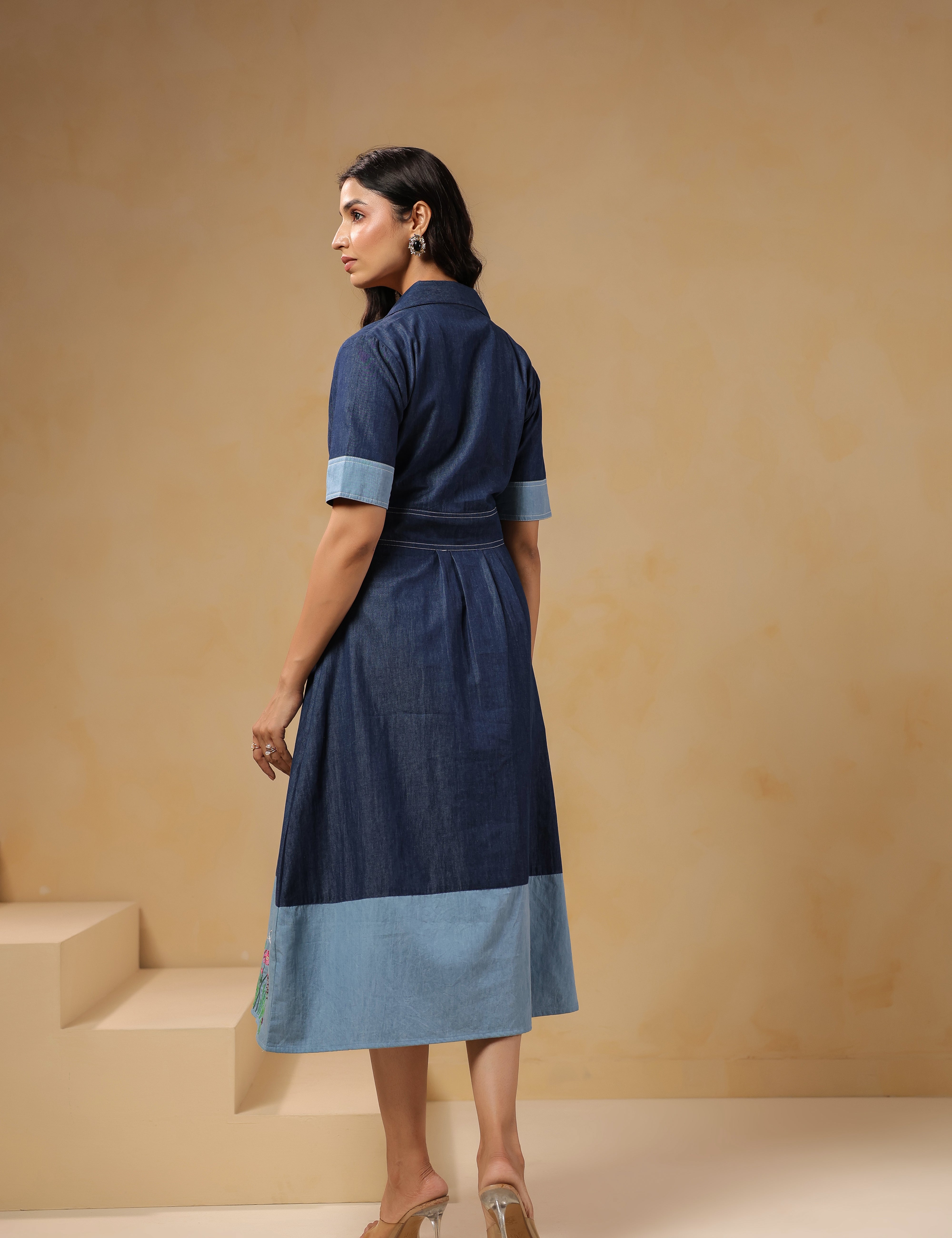 Back view of Woodland Muse Midi Dress with contrast cuff sleeves and flared hemline